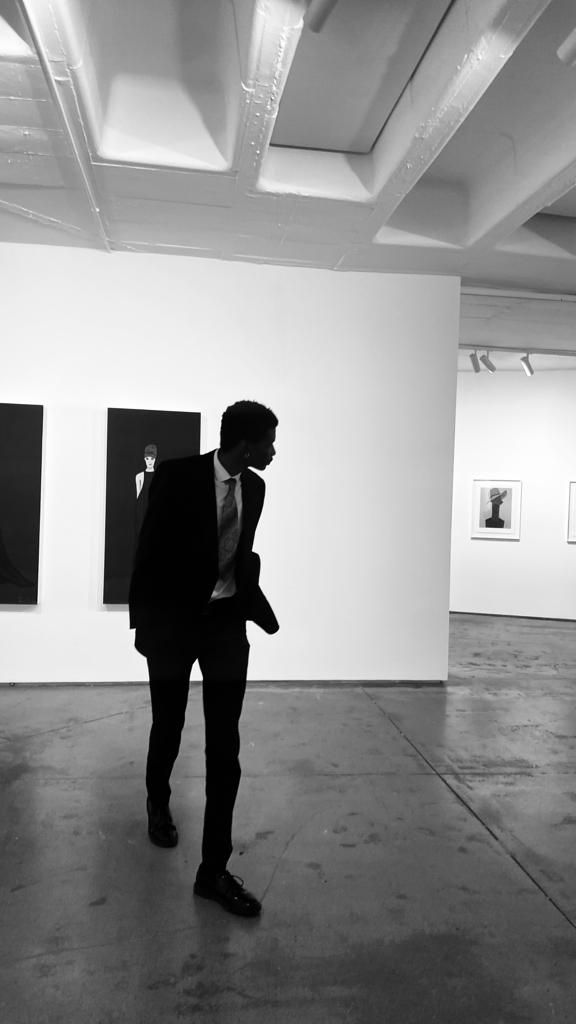 The Agenda founder in a contemporary art gallery