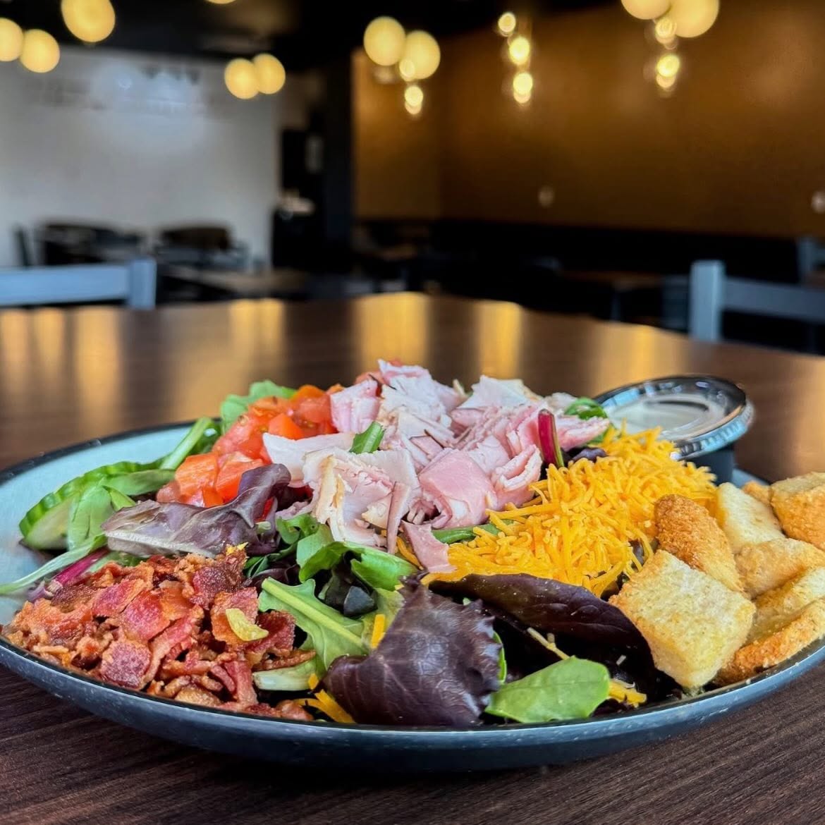 Chef's salad with bacon, ham, and cheddar