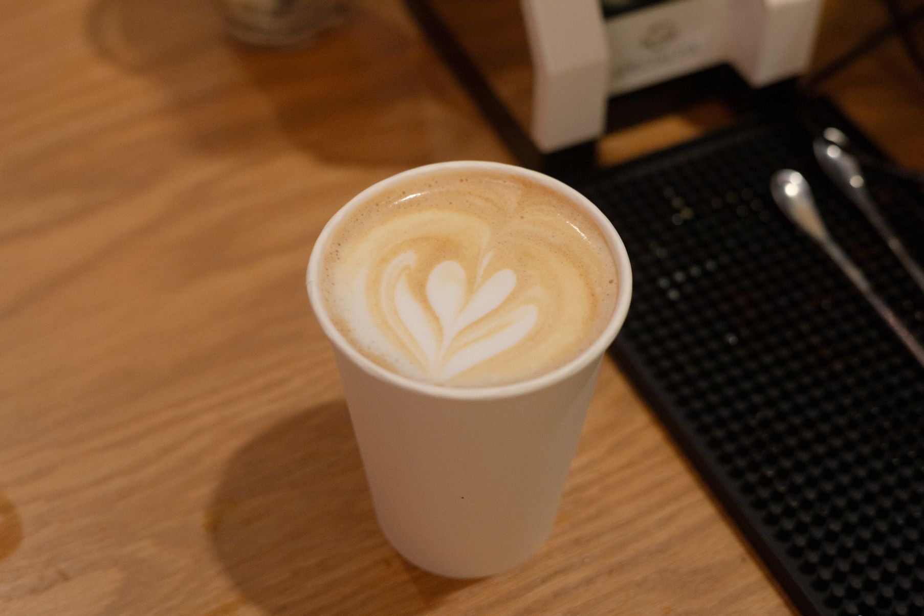 Artisan latte with heart foam art - Specialty coffee drinks for event catering Omaha