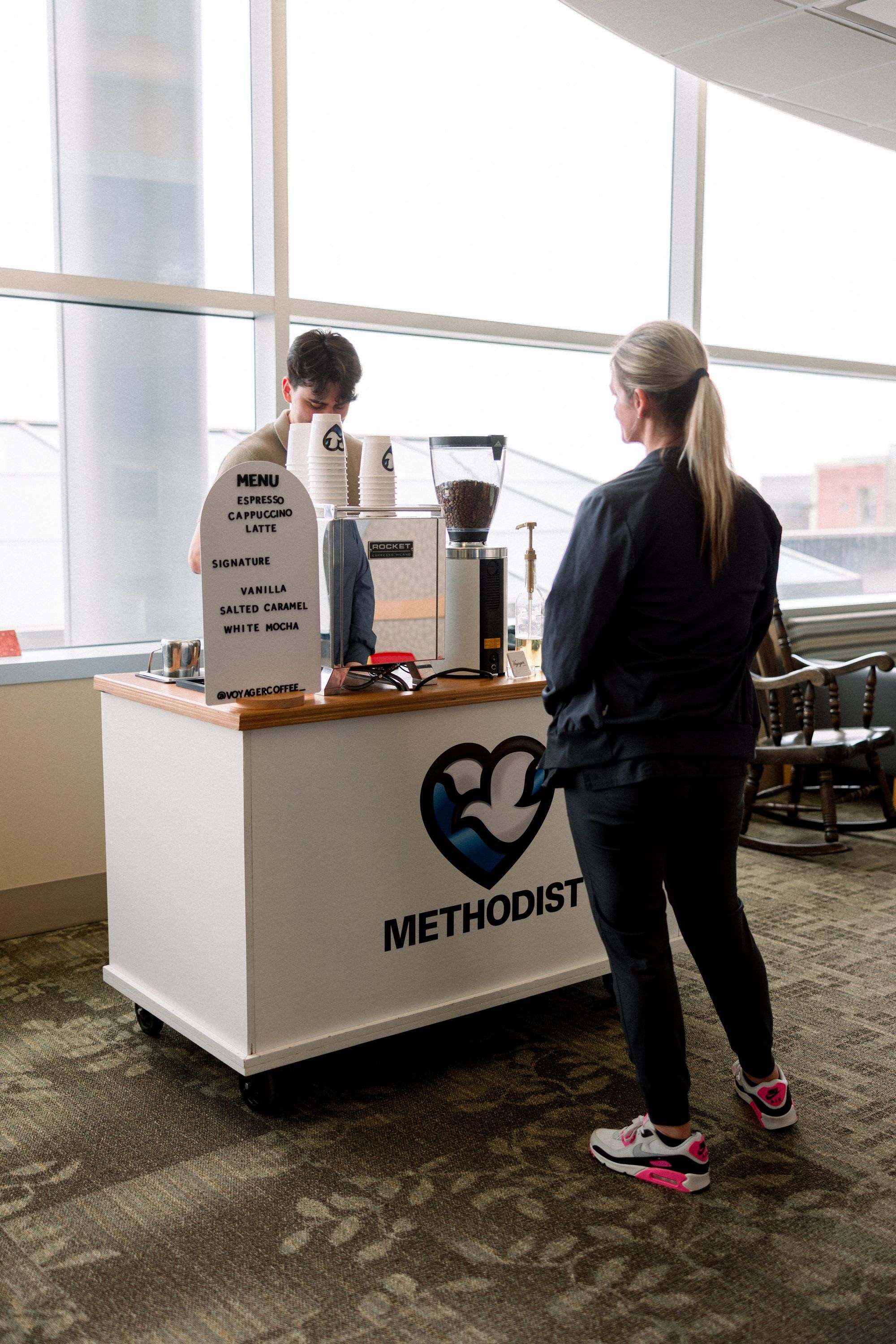 Mobile coffee cart setup at Methodist corporate event in Omaha - Professional event coffee catering service