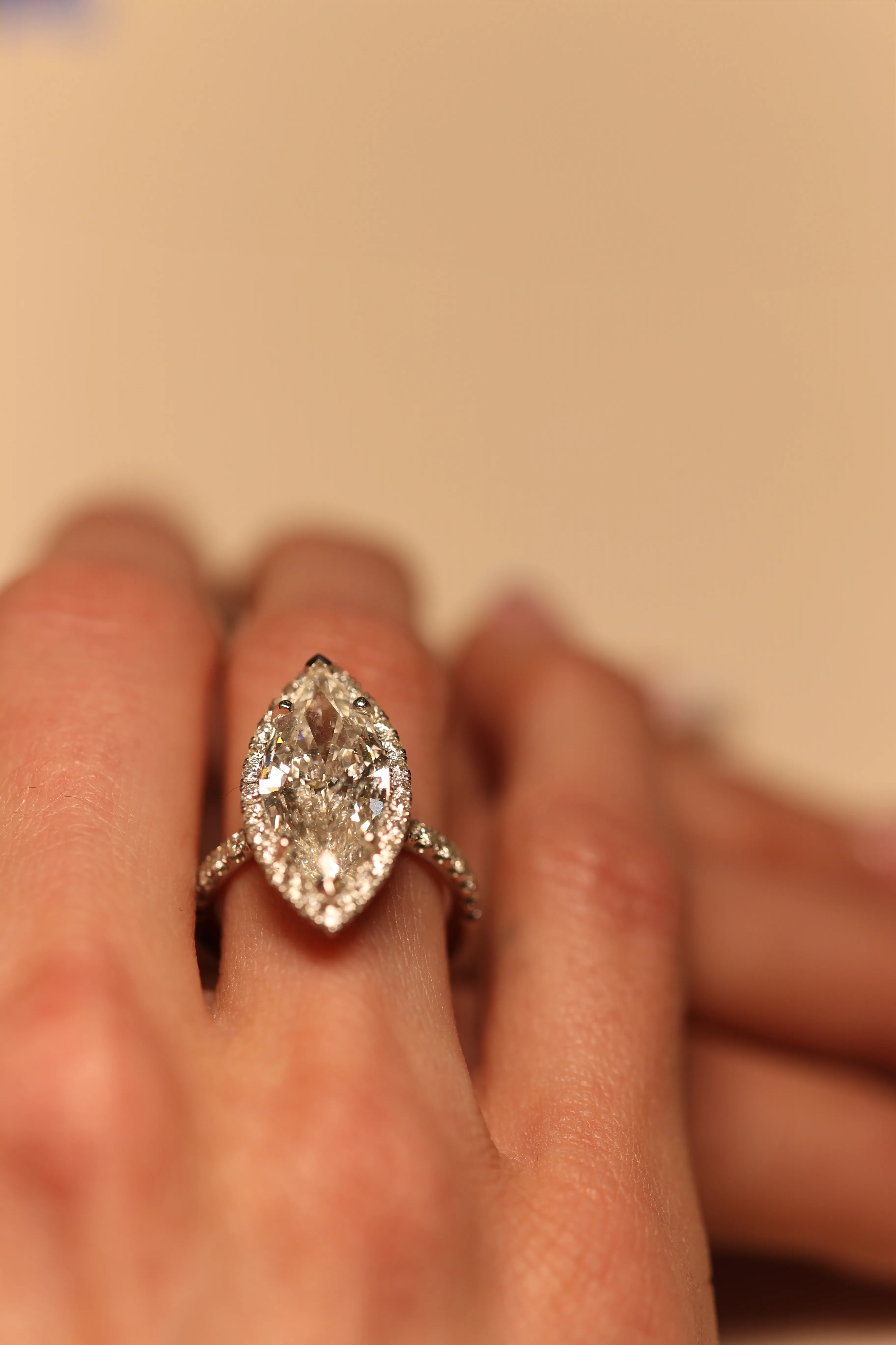 Close-up of marquise cut diamond engagement ring