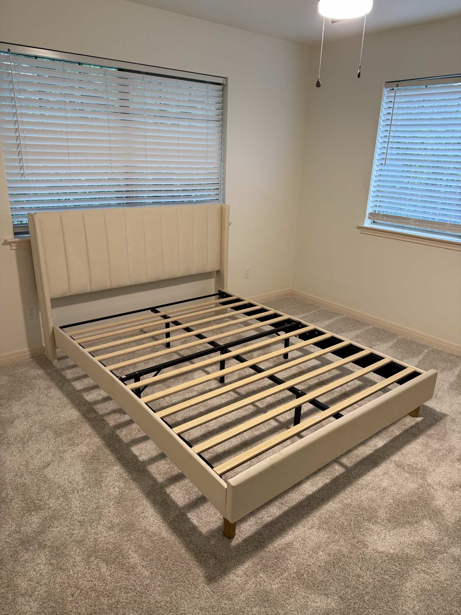 Upholstered bed frame assembly