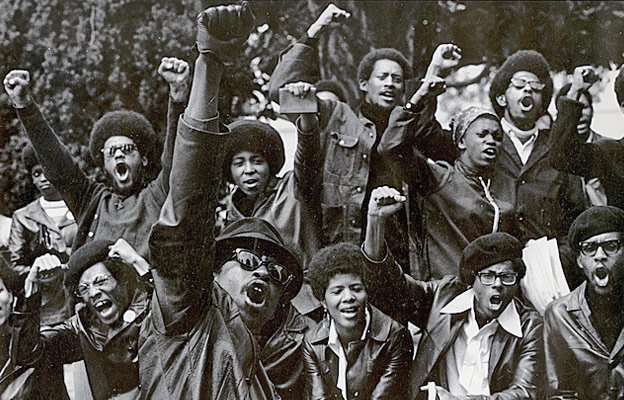 Black activists with raised fists showing solidarity