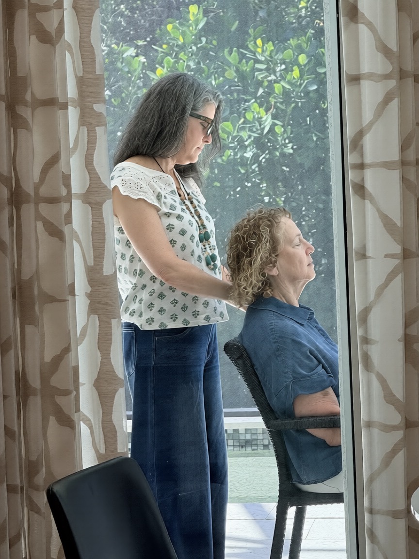 Amy performing a custom healing session