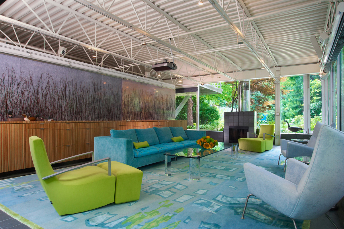 Industrial living room with teal and lime furniture