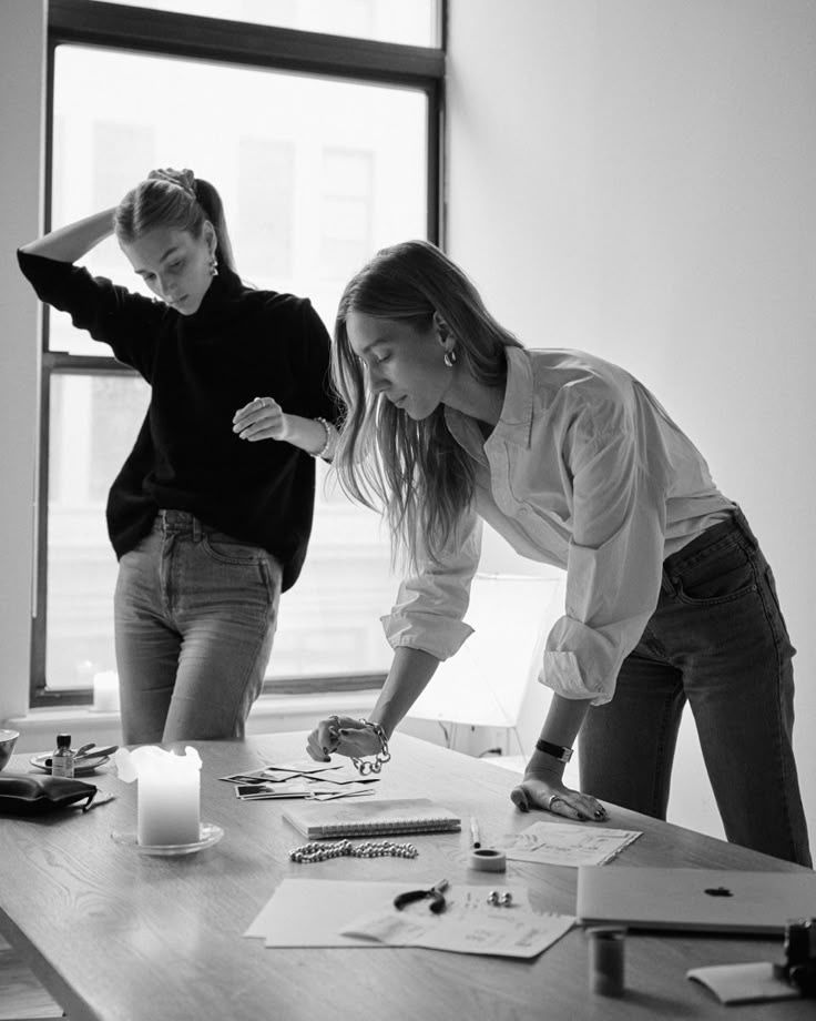 Creative professionals working together at a desk