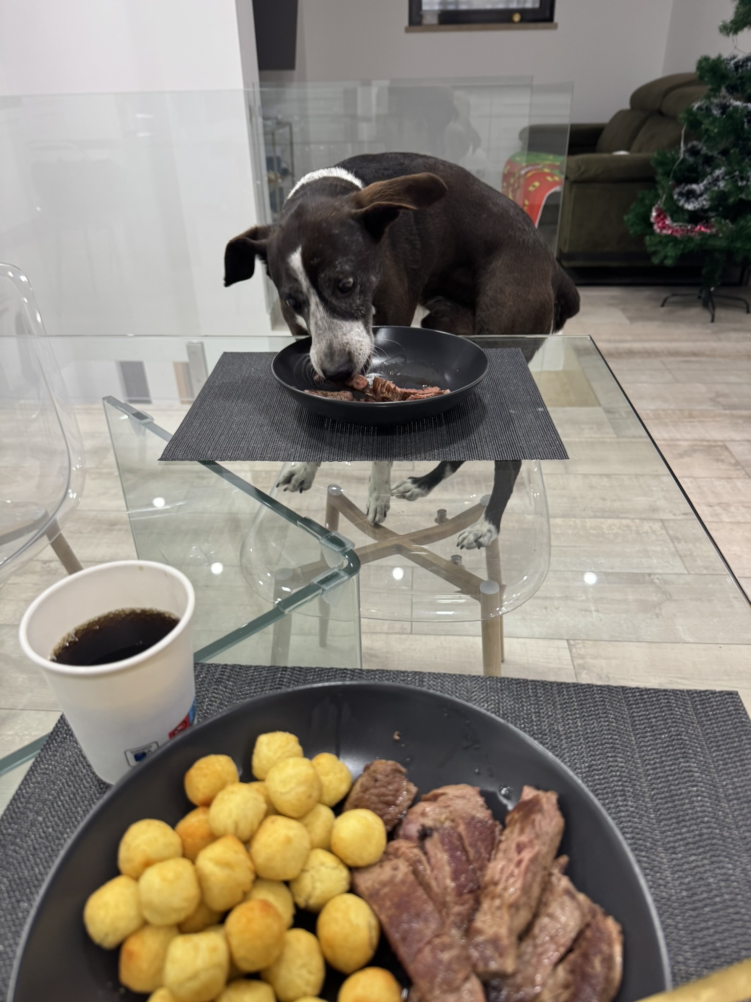 Sukuna eating at the table