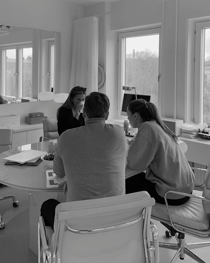 Team collaborating in a meeting around a table
