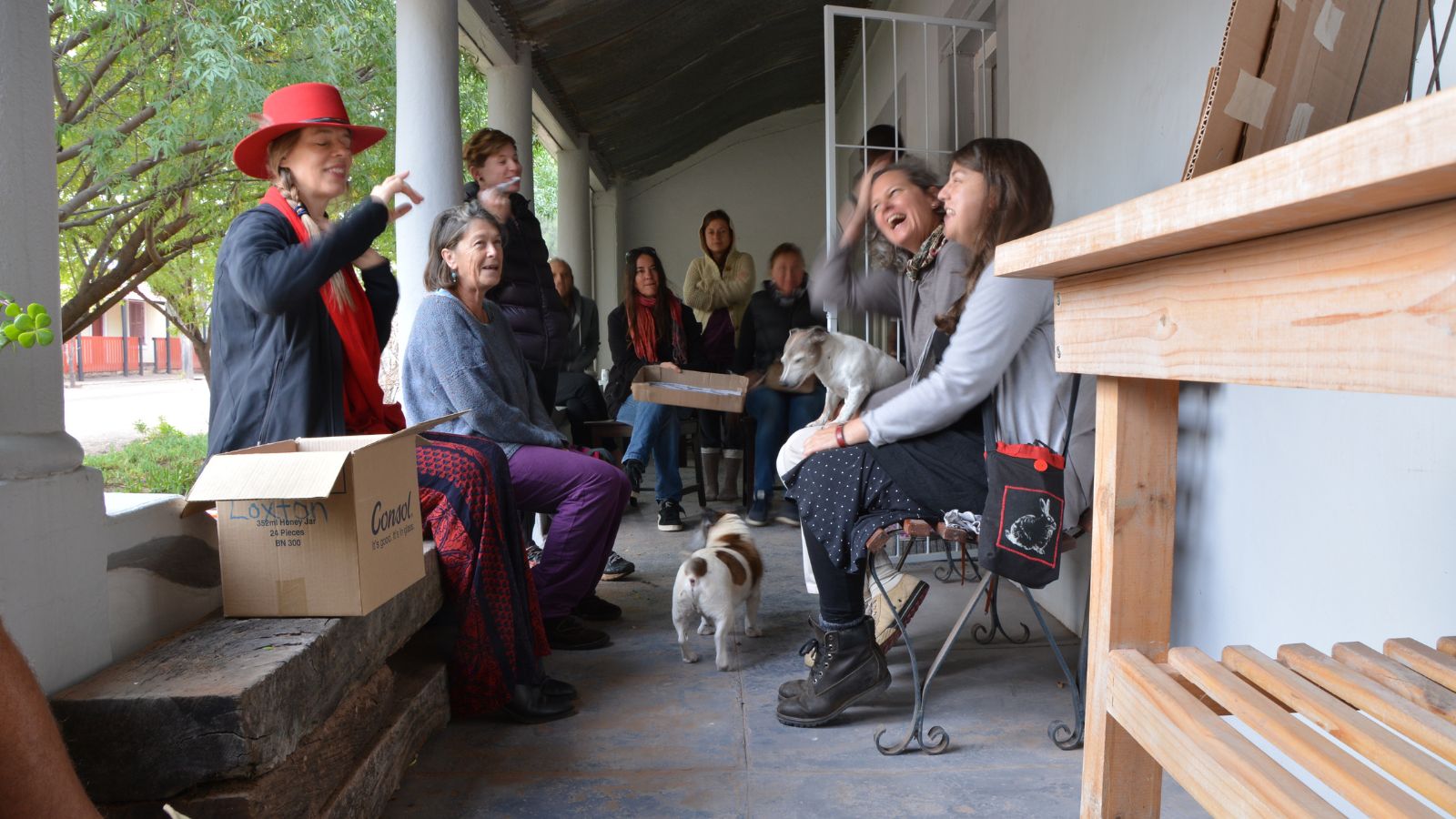 Community gathering with artists presenting