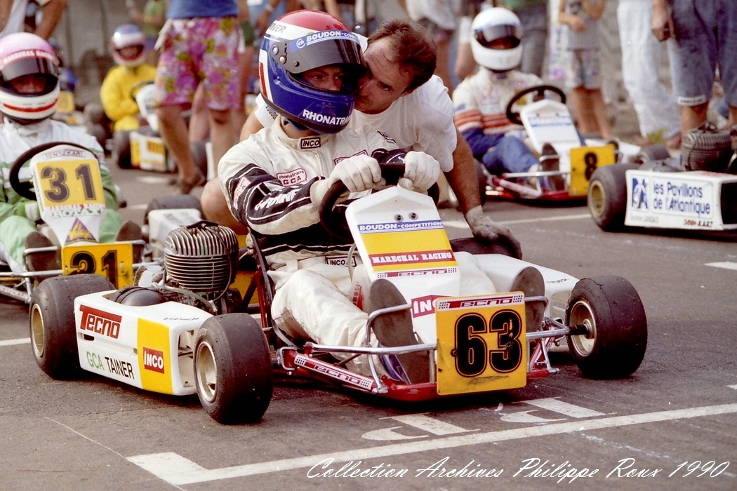 Christian Boudon coaching driver #63 on the grid, 1990