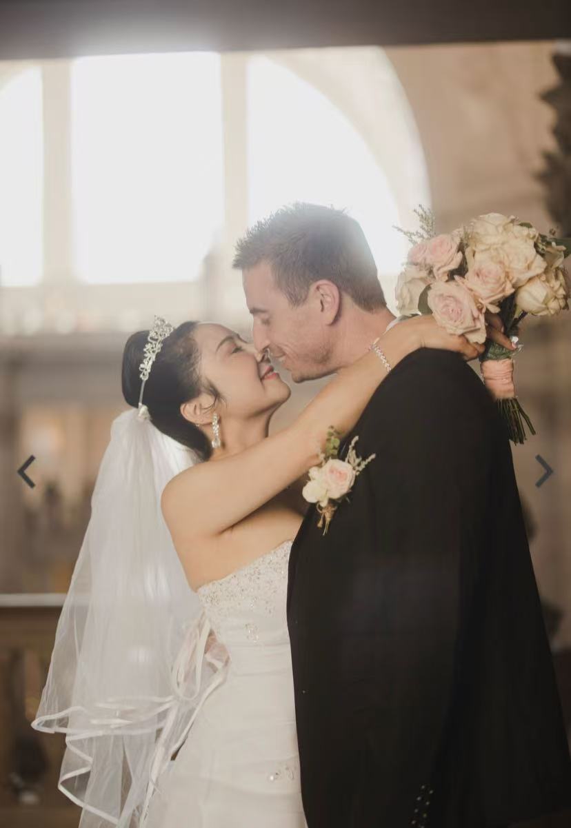 Romantic couple portrait with bride in strapless gown