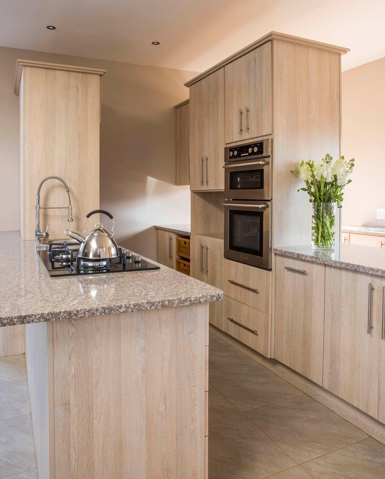 Light Oak Kitchen with Granite Countertops