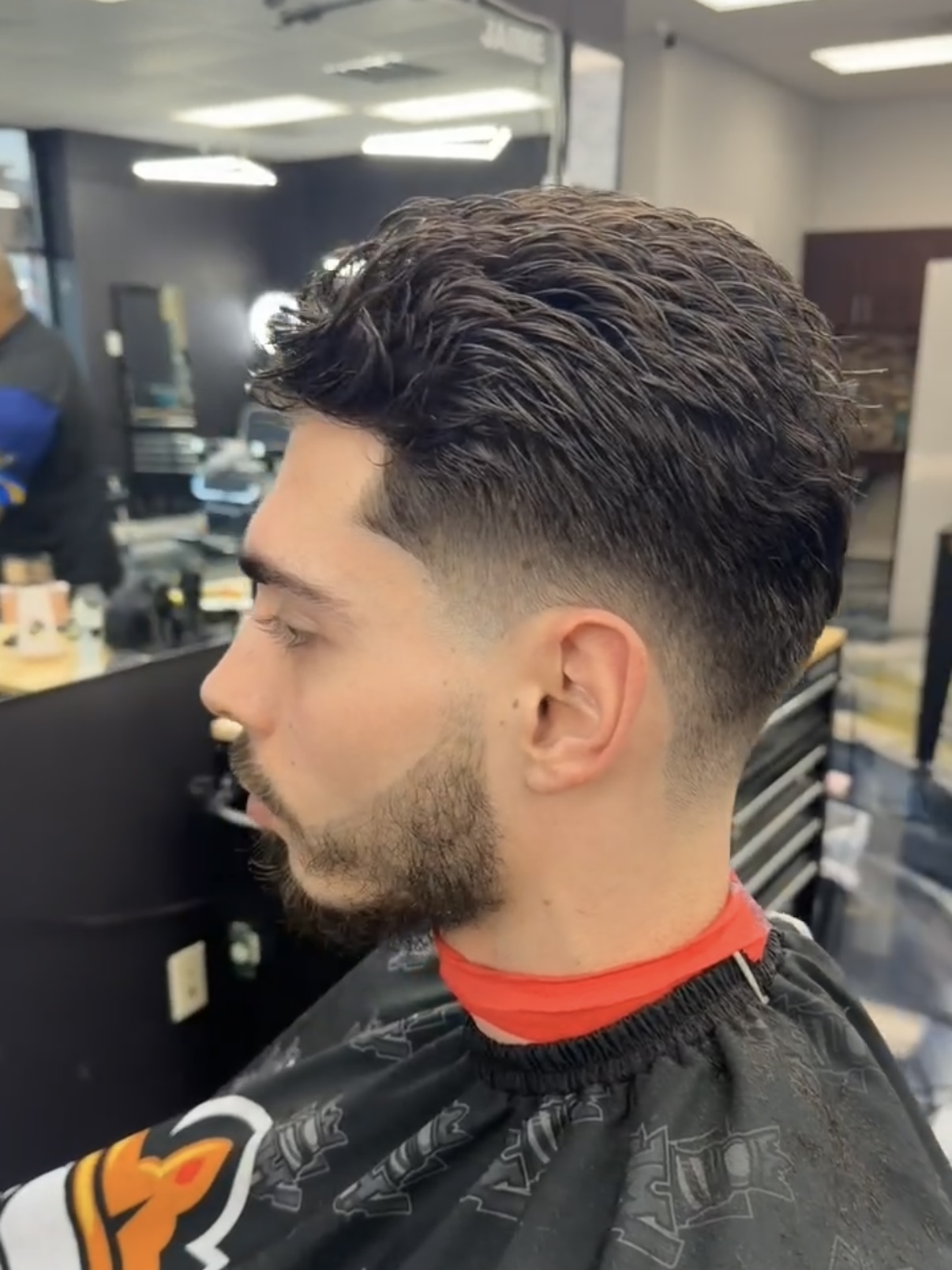 Textured wavy hair with fade