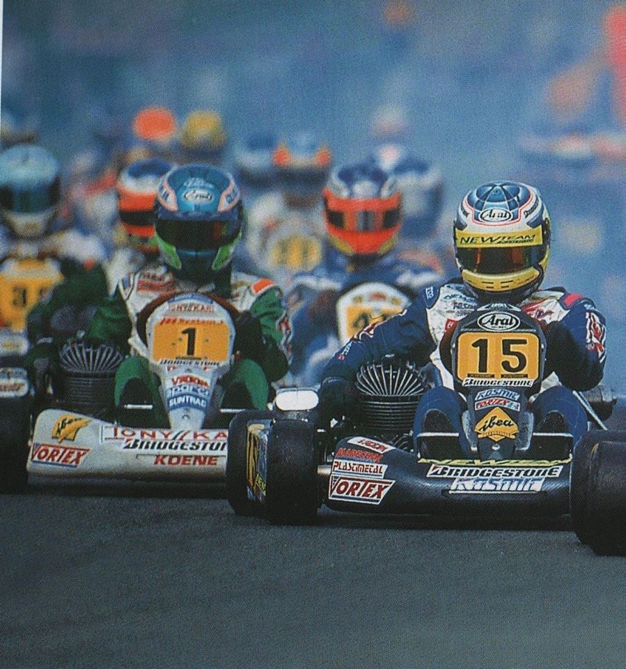 Intense karting battle between drivers