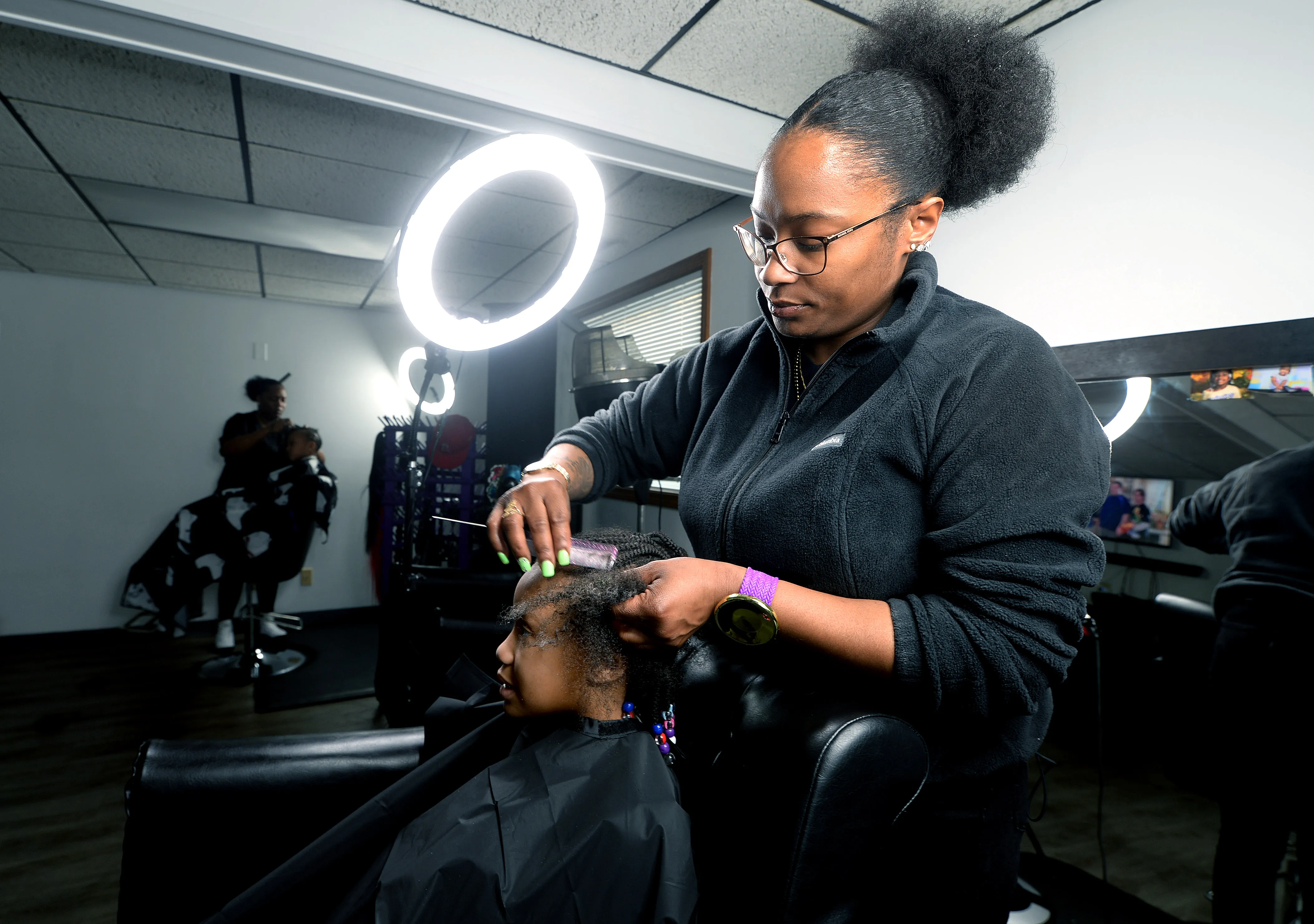 Professional stylist working in a modern salon