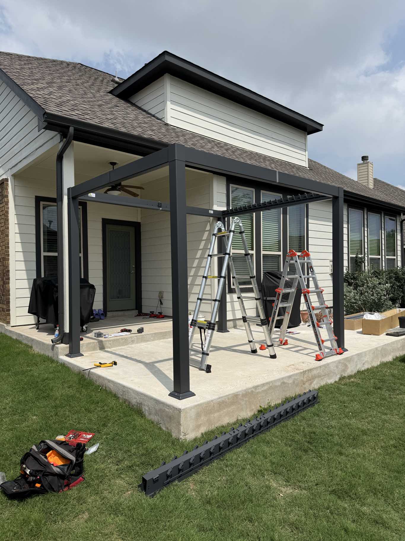 Pergola installation on backyard patio