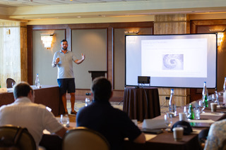 Presenter speaking to founders