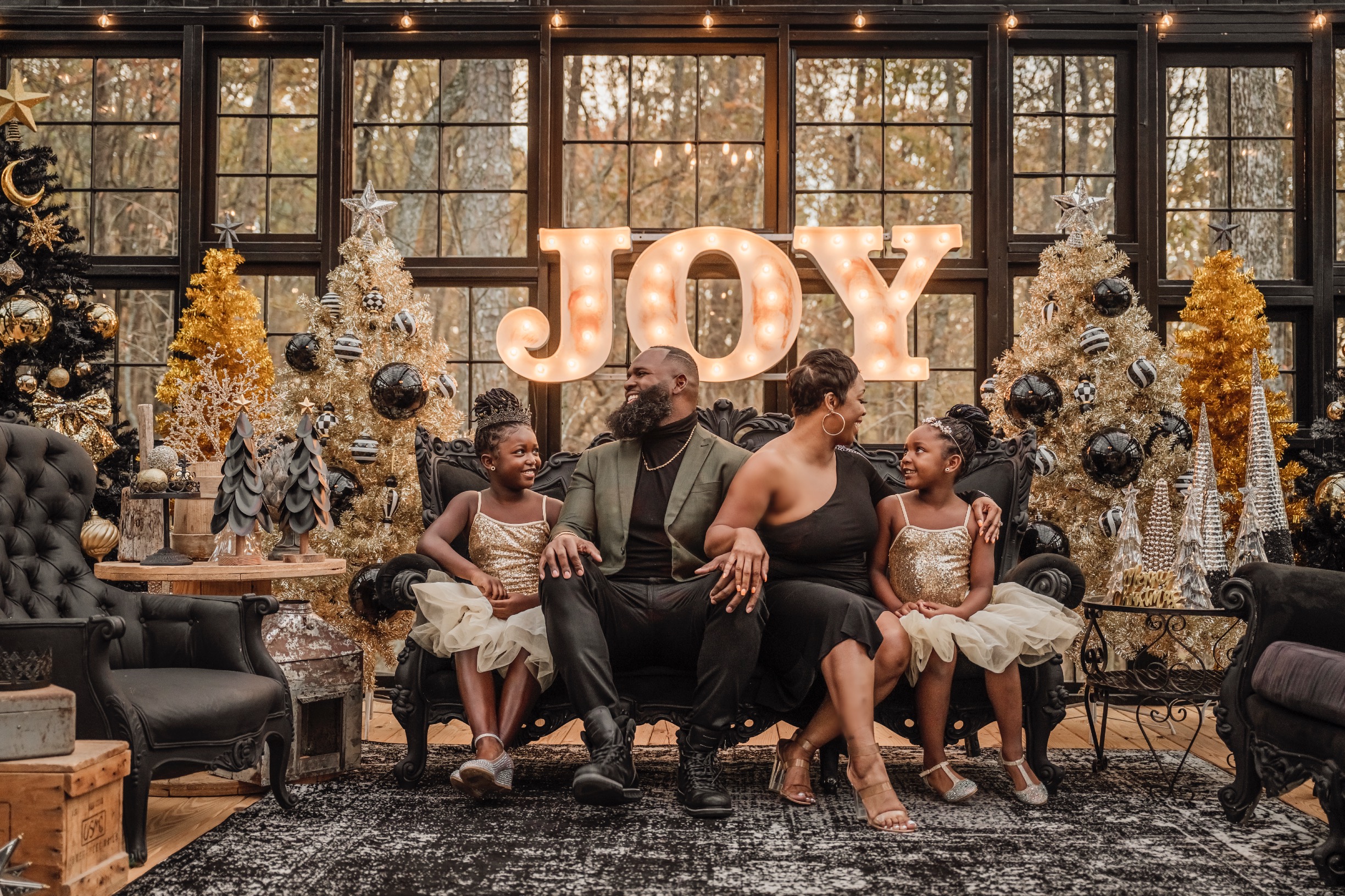 Andre Fluellen and family at a festive holiday celebration