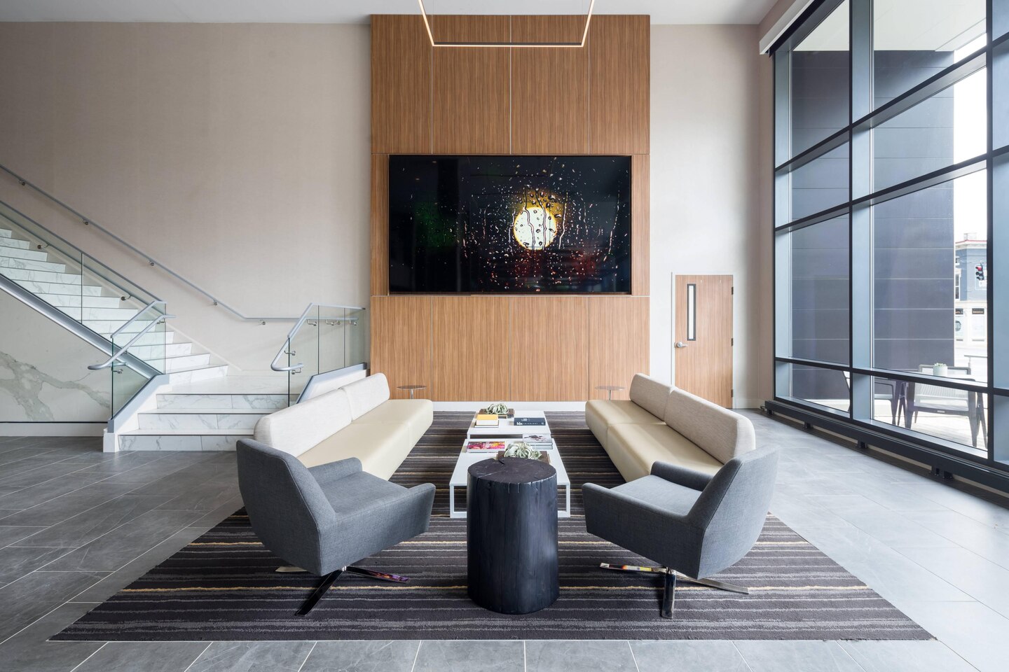 AC Hotel Indianapolis — Structural Glass Stair with Marble Treads