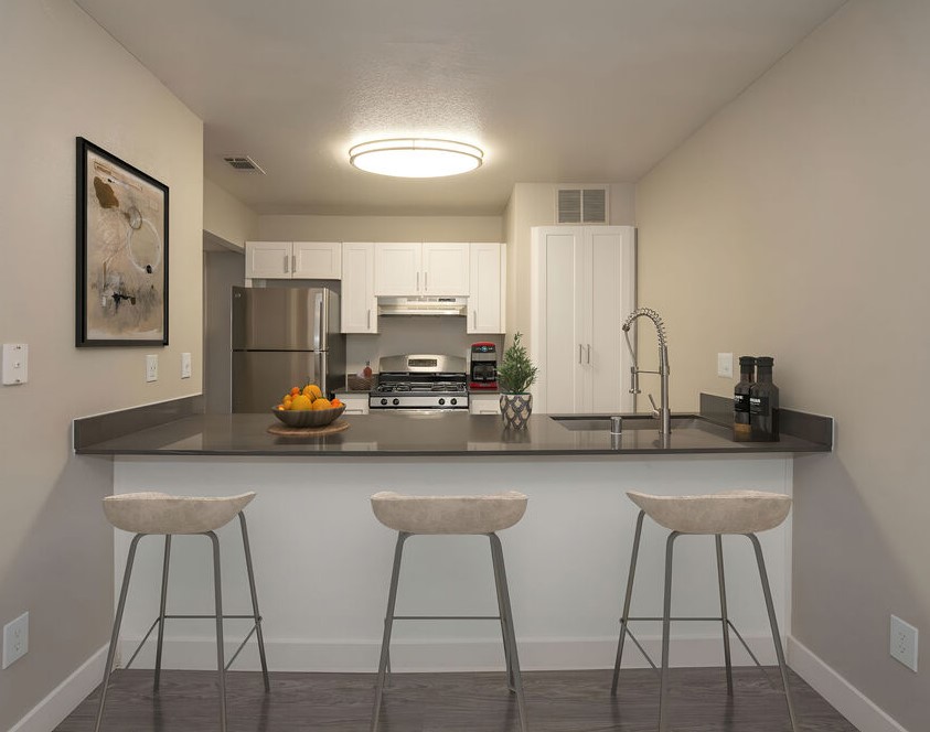Azure II — White cabinets, gray quartz peninsula