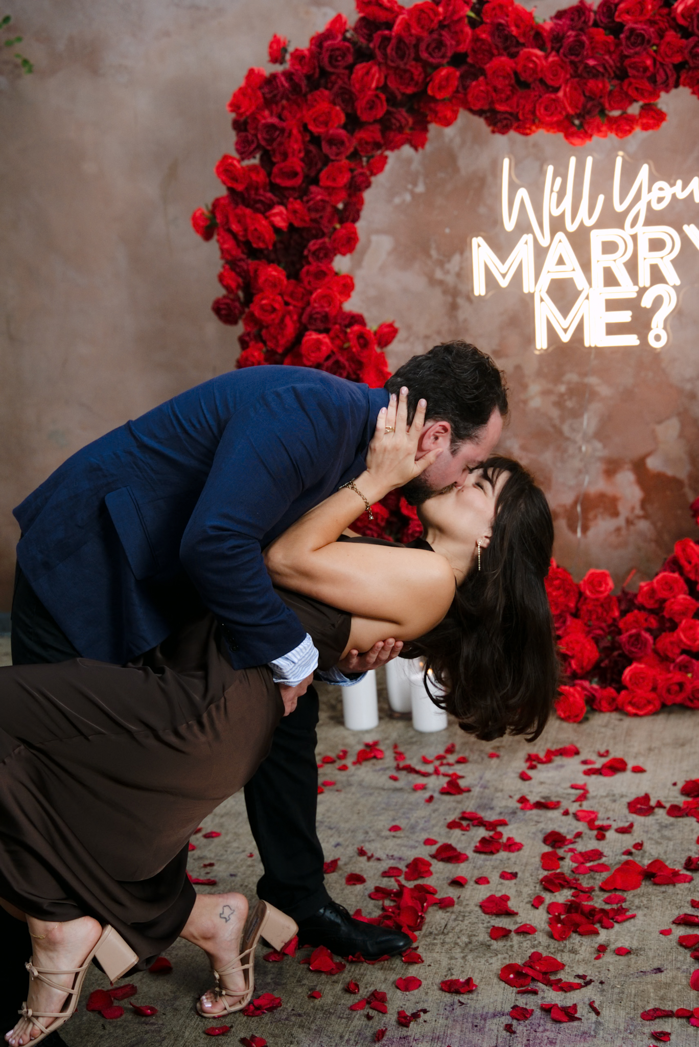 Romantic couple embracing during proposal