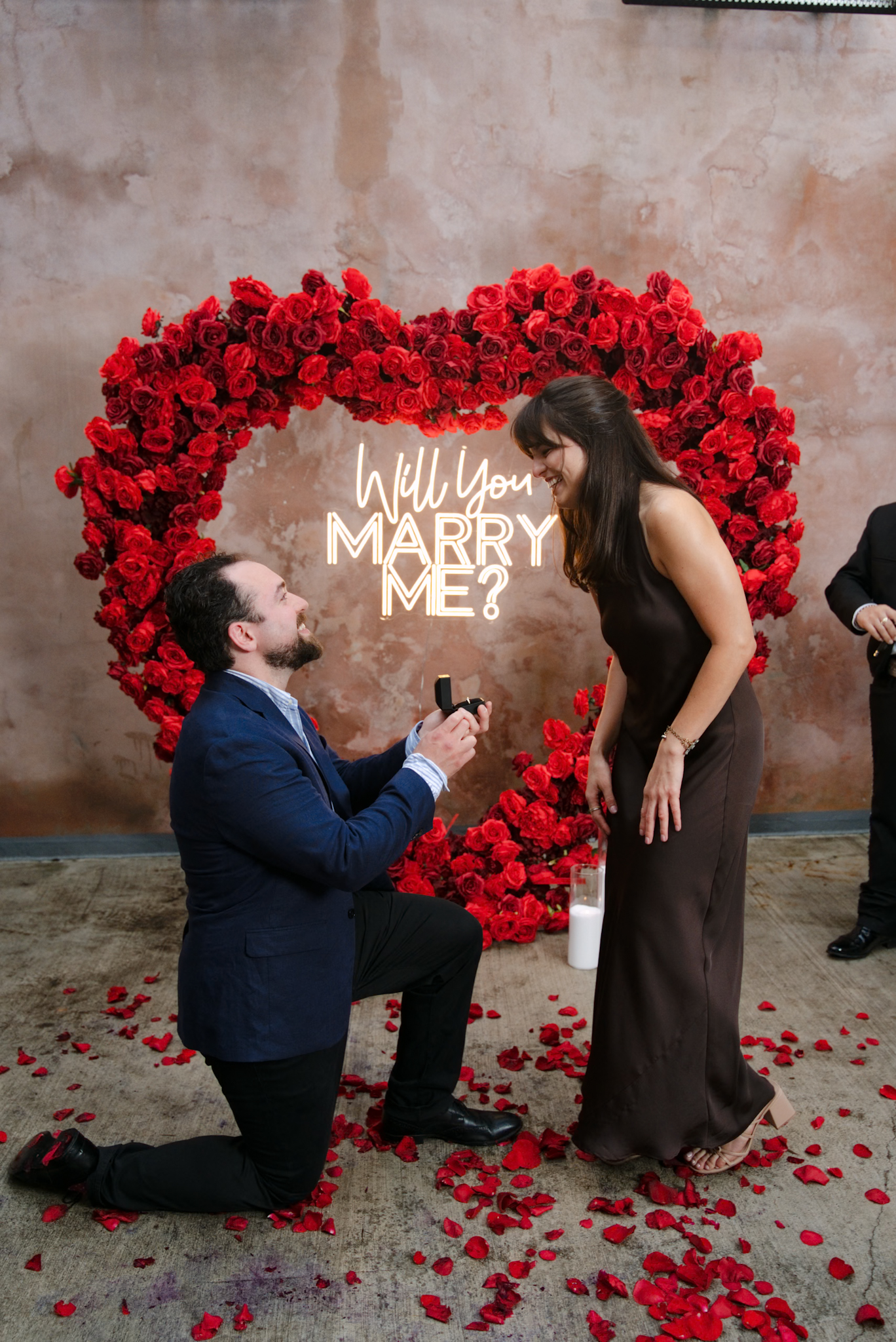 Proposal moment - man on knee with ring