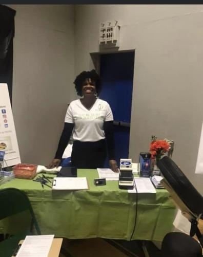 Dr. Mukaia at Black Expo health booth