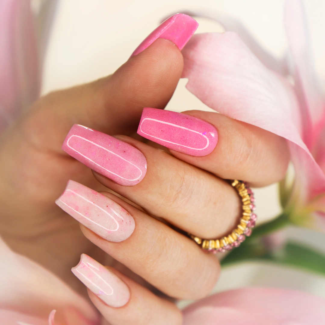 Pink ombre coffin nail extensions with floral background by Colour Workshop Singapore