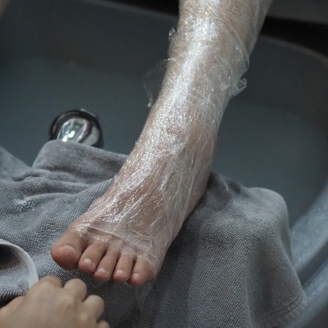 Spa foot treatment with plastic wrap for deep moisturizing by Colour Workshop Singapore