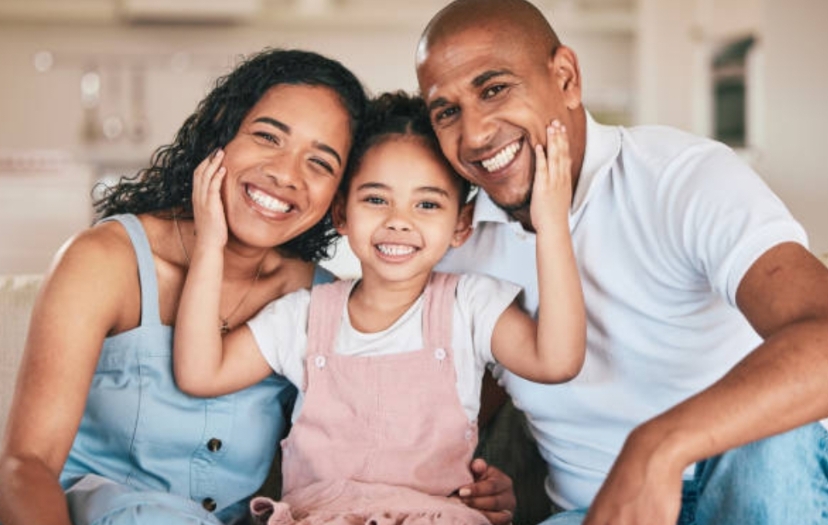 Happy family representing our mission