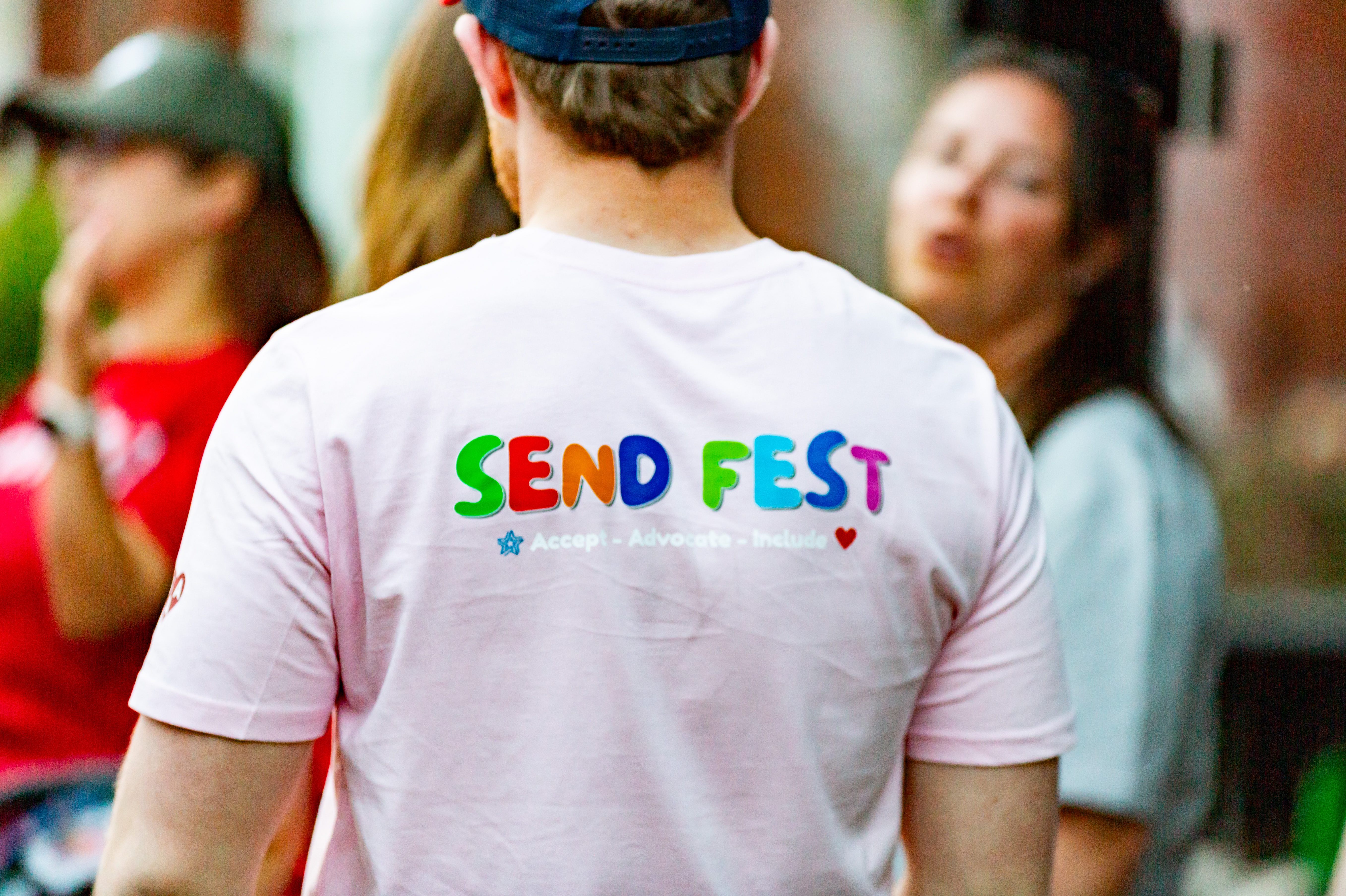 Volunteer in a SEND Fest t-shirt at the event