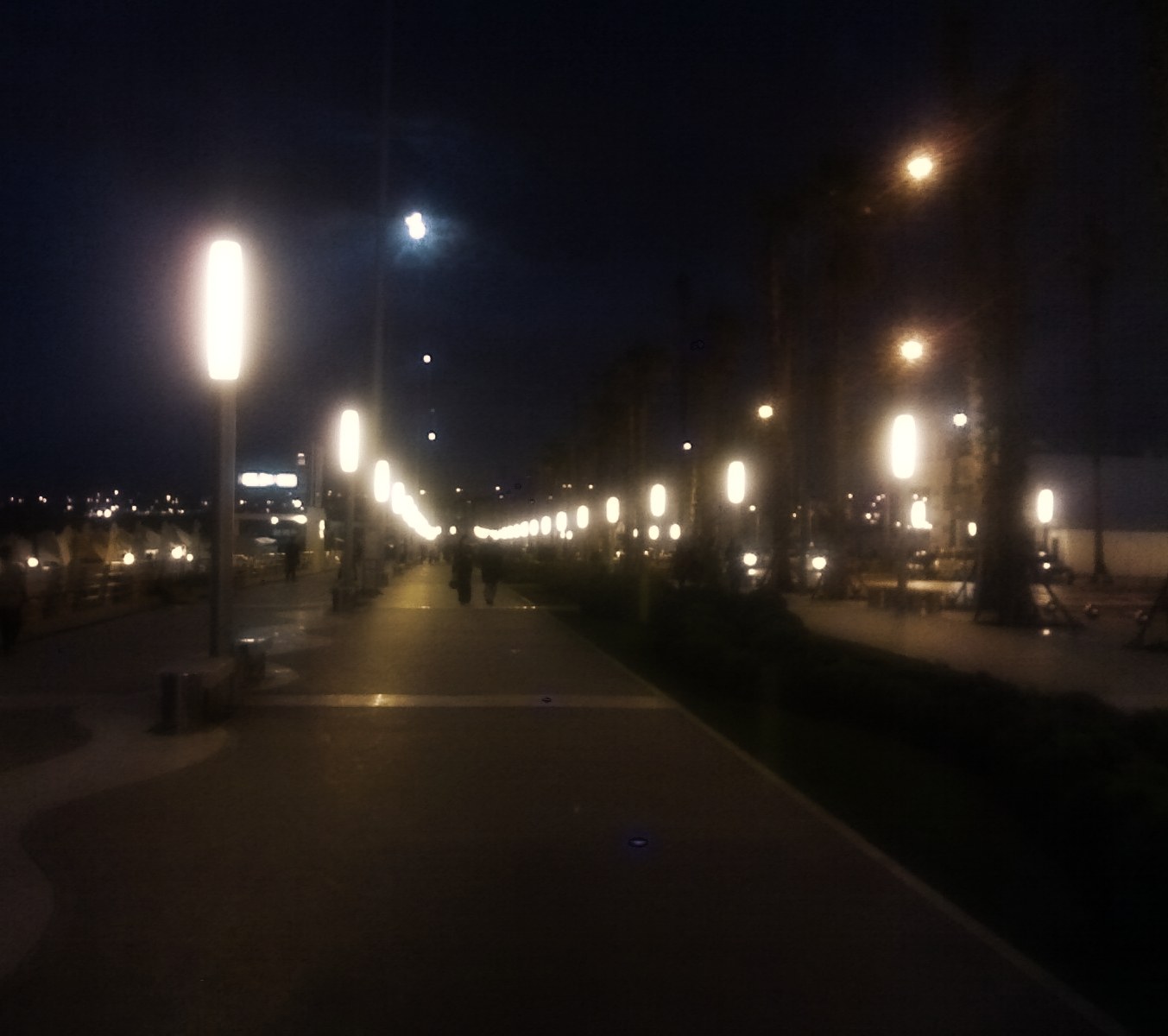 Casablanca Corniche Ain Diab night walkway with city lights