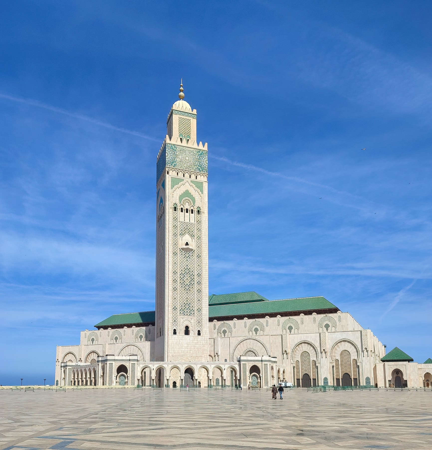 Hassan II Mosque exterior in Casablanca under a blue sky