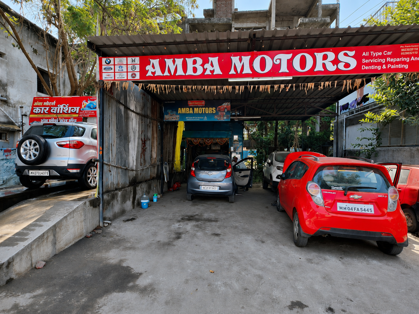 Cars receiving service at Amba Motors