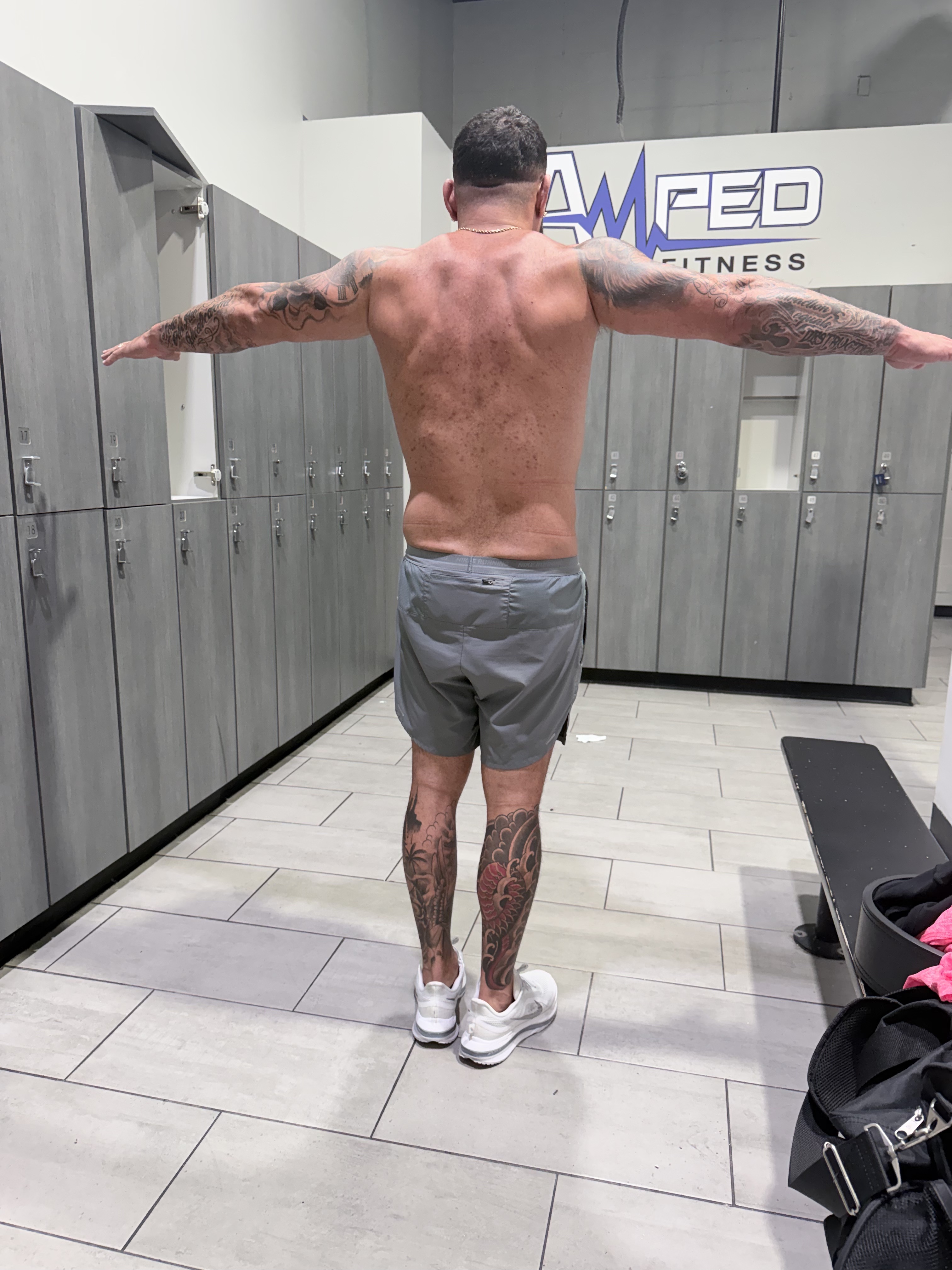 Same client — back view after consistent training