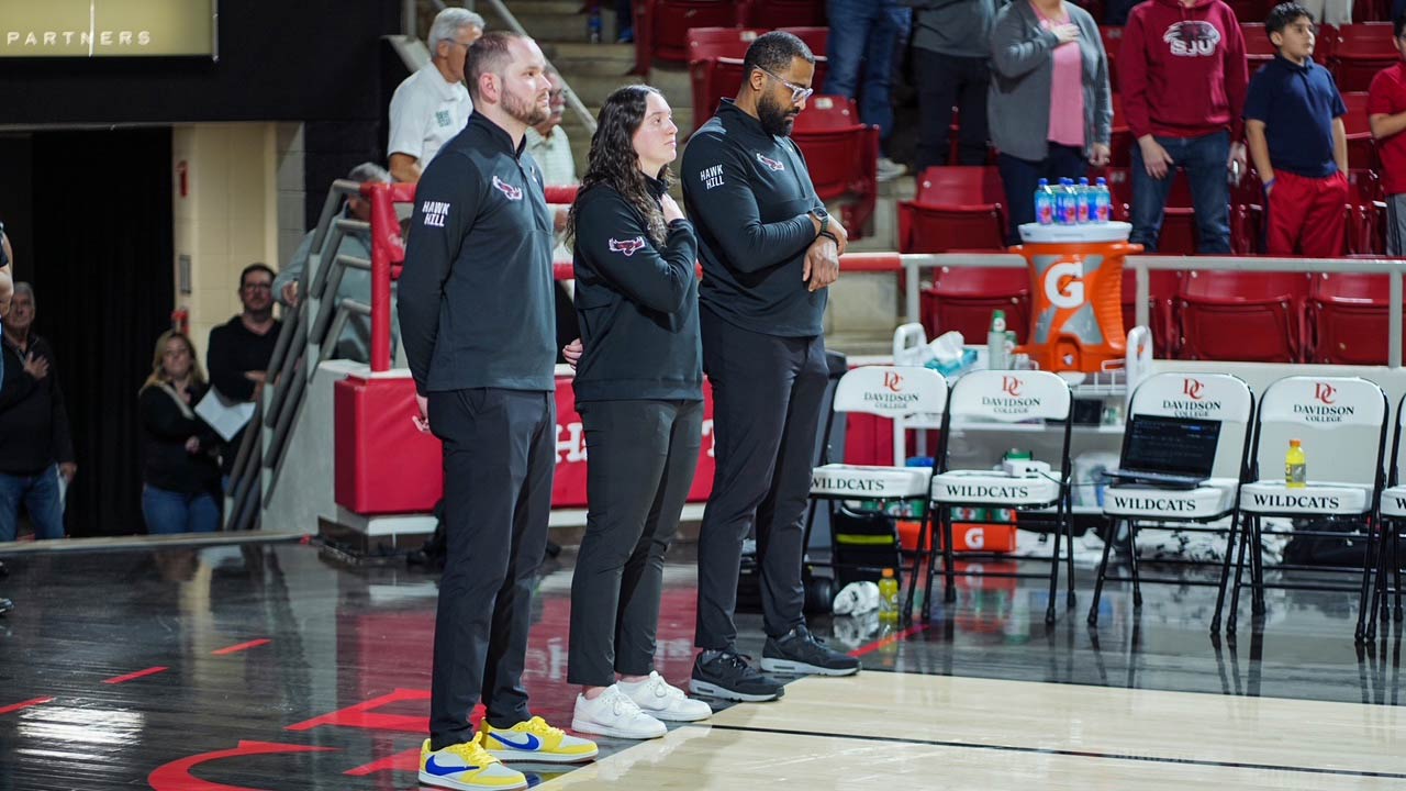 Coaching Staff Standing During Game