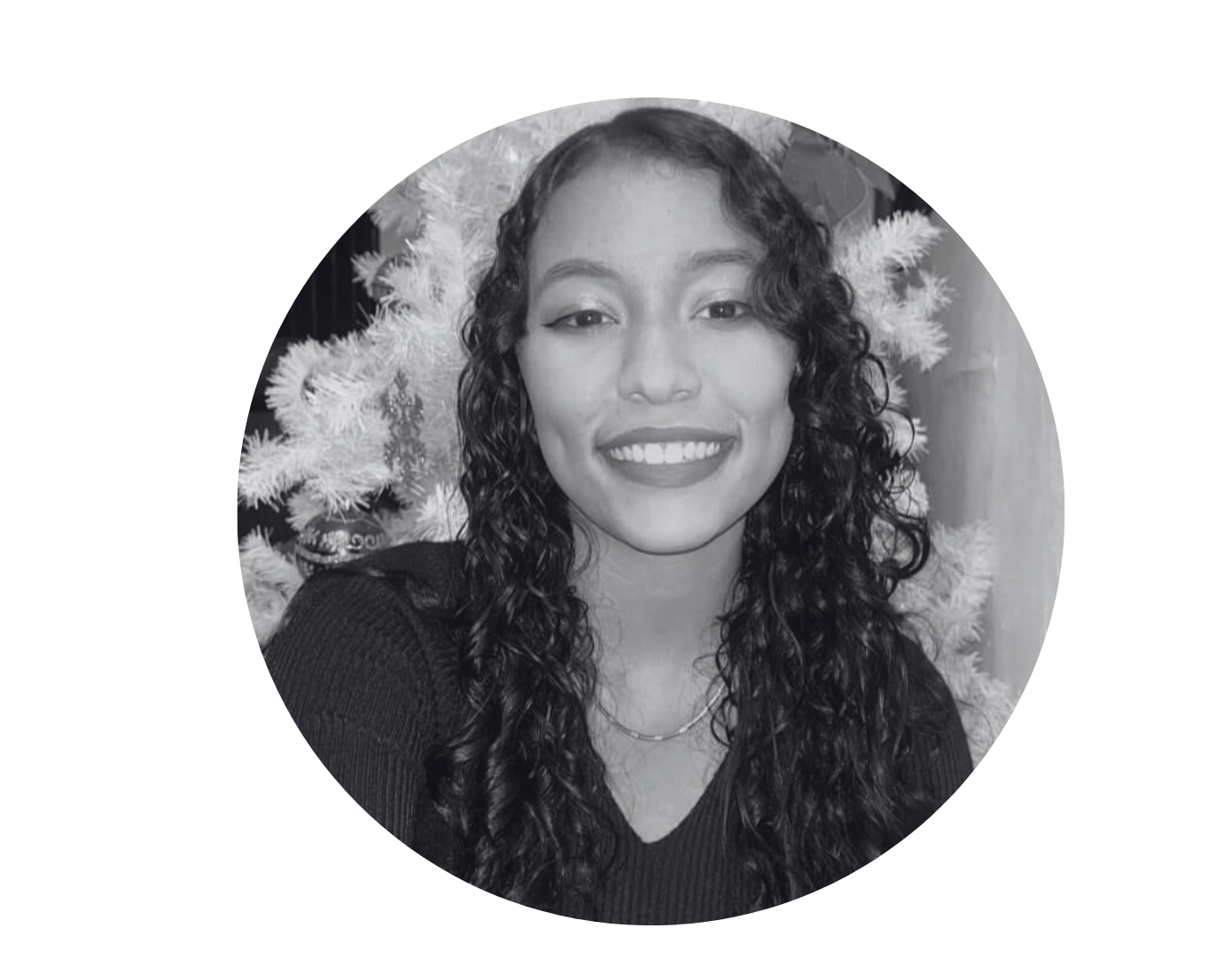 Portrait of a woman with curly hair smiling