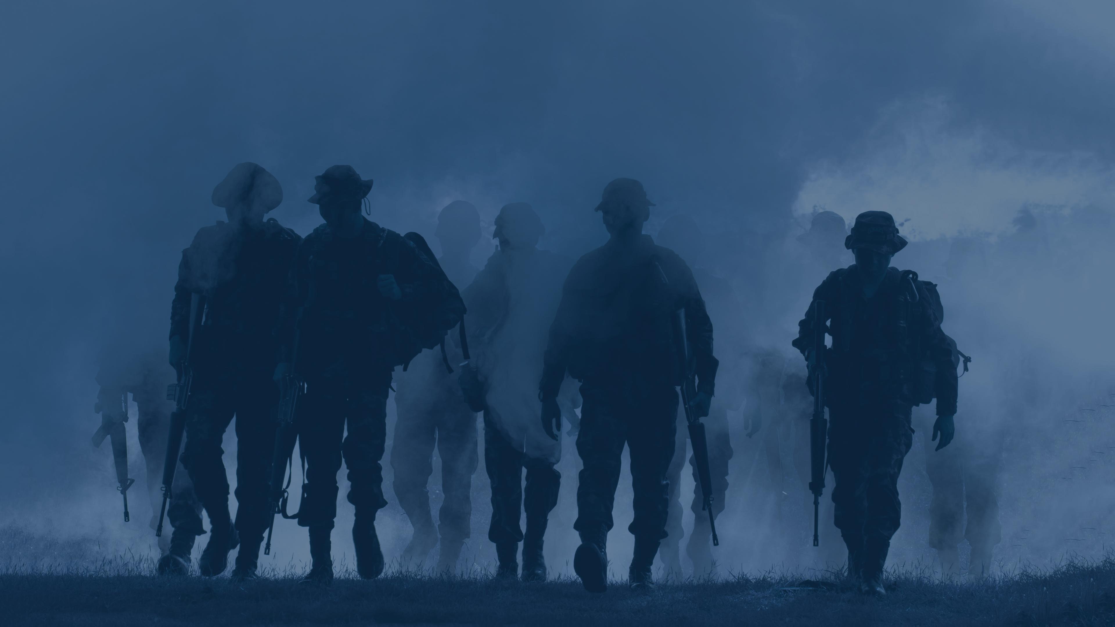 Military personnel in fog