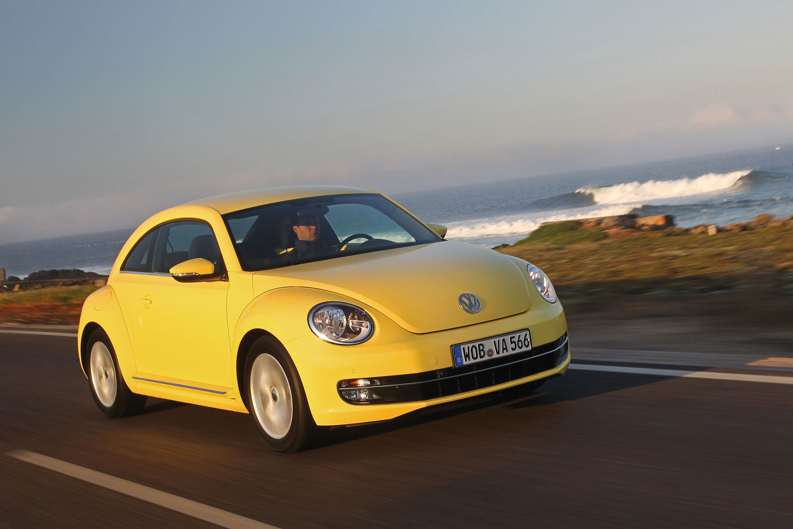 Volkswagen Beetle on coastal road