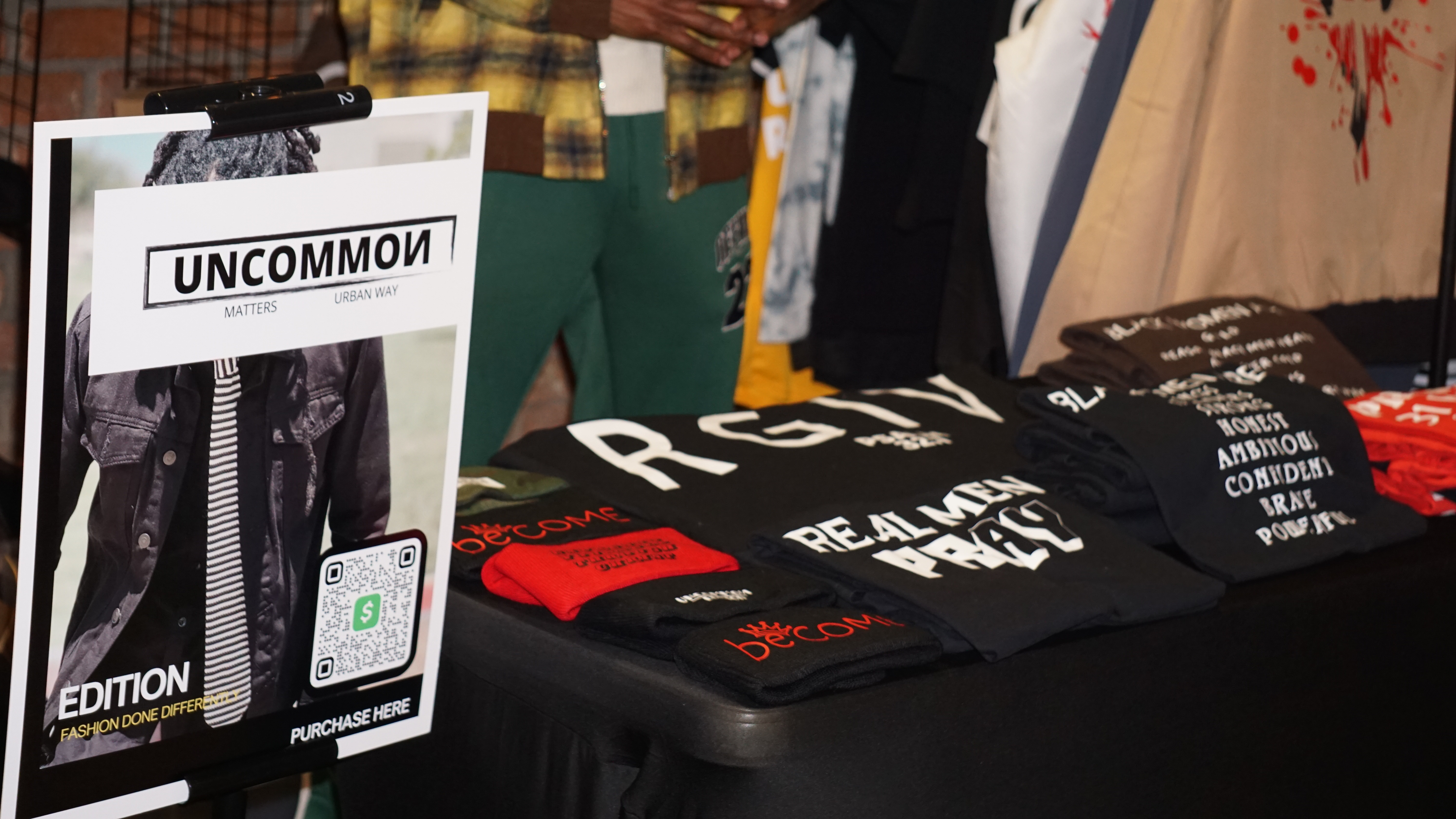 Vendor booth with urban fashion merchandise