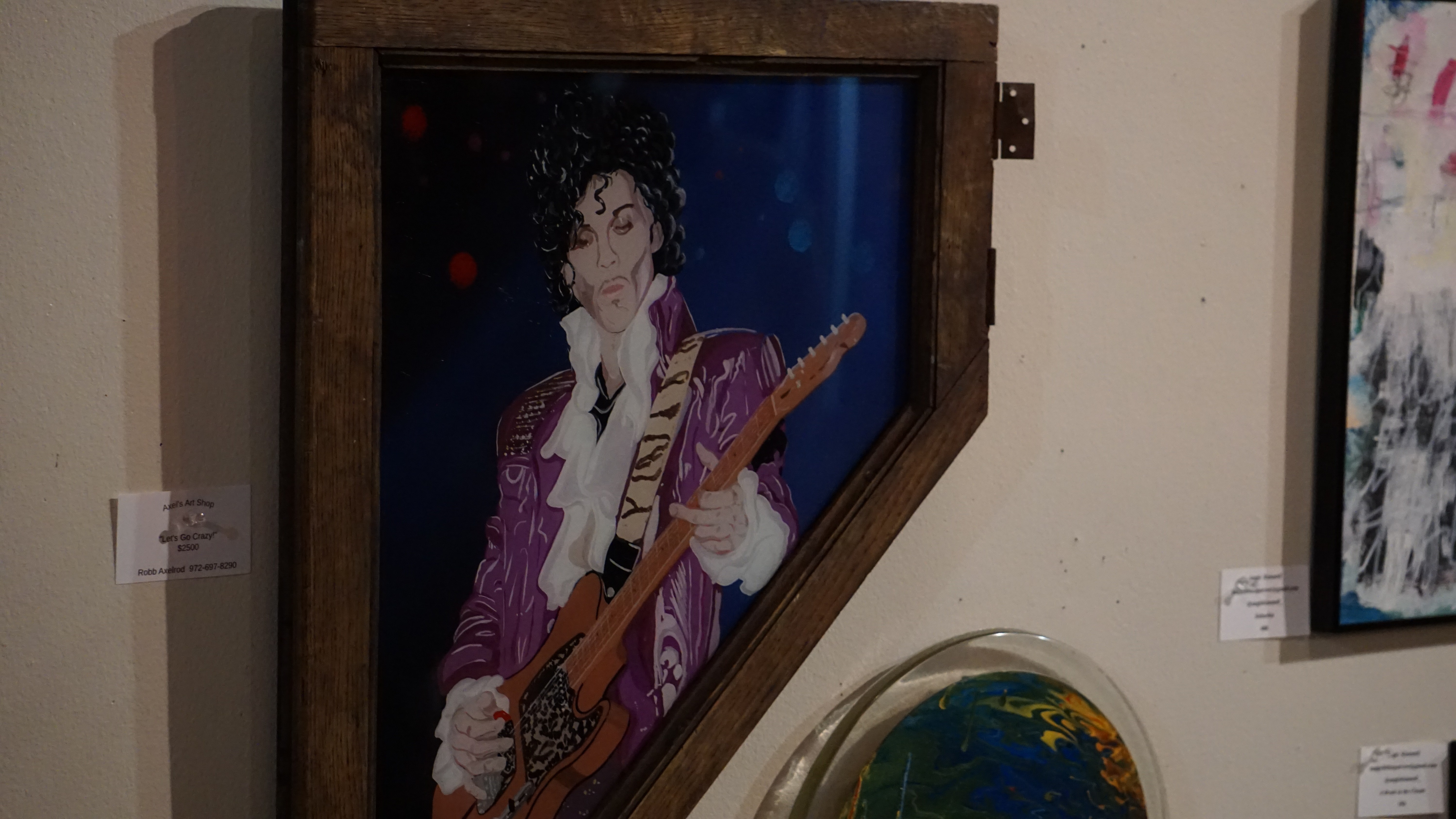 Prince painting in rustic wooden frame