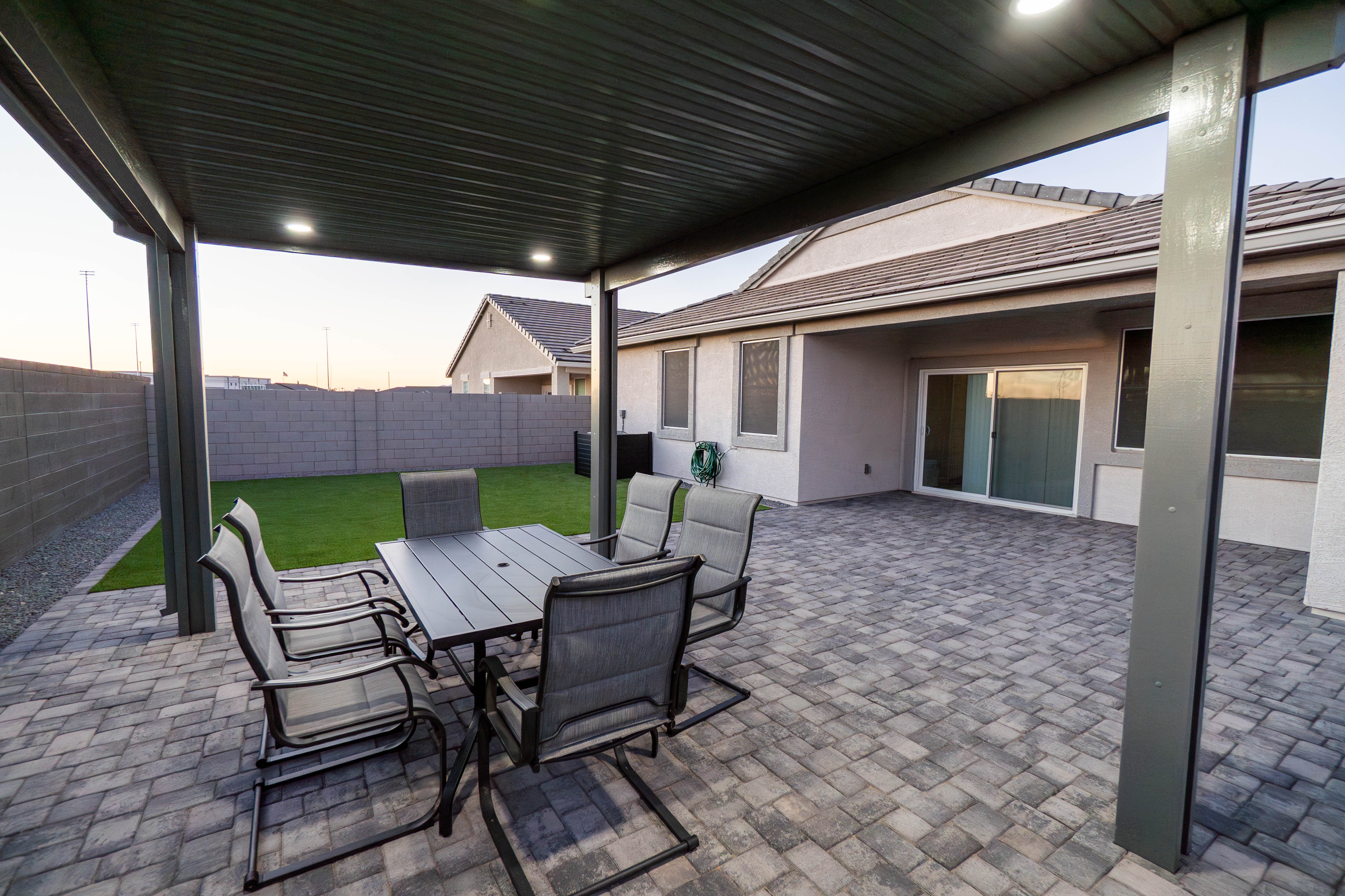 Backyard Dining Patio with Turf