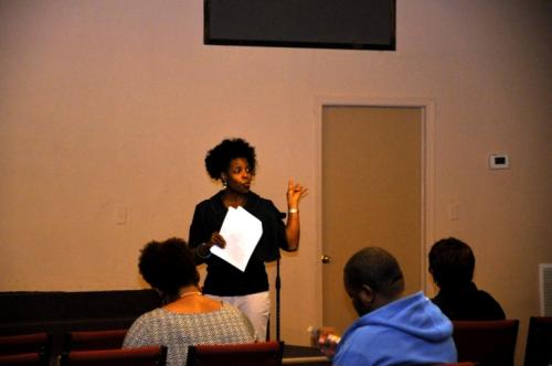 Dr. Mukaia speaking to group about health and wellness