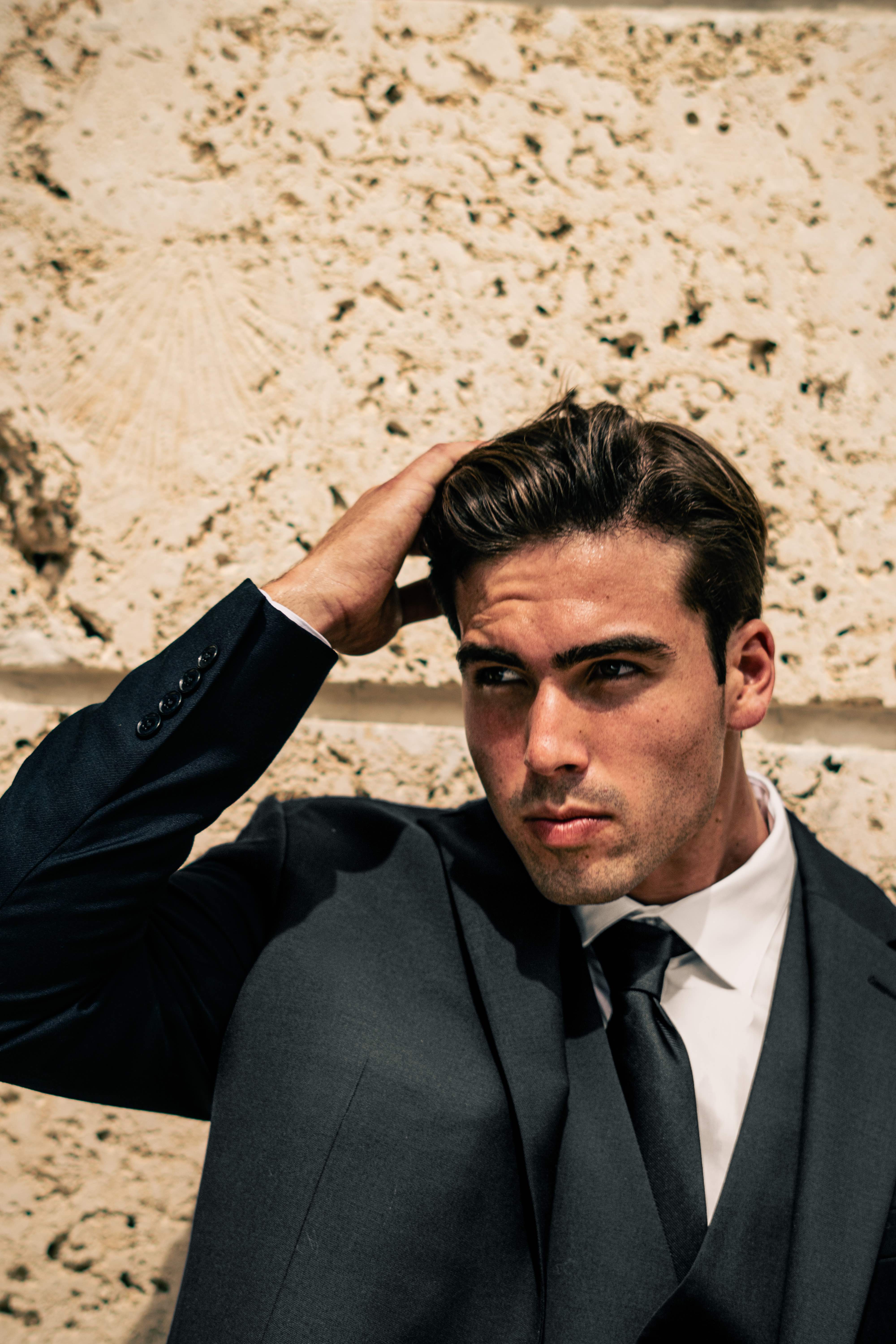 Christian Utne portrait in a grey suit