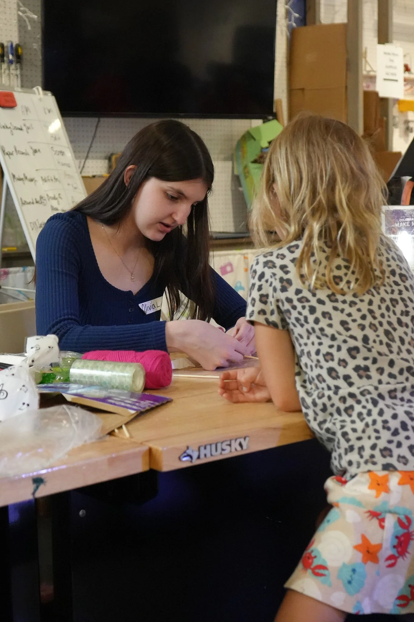 Tutor working with a young student