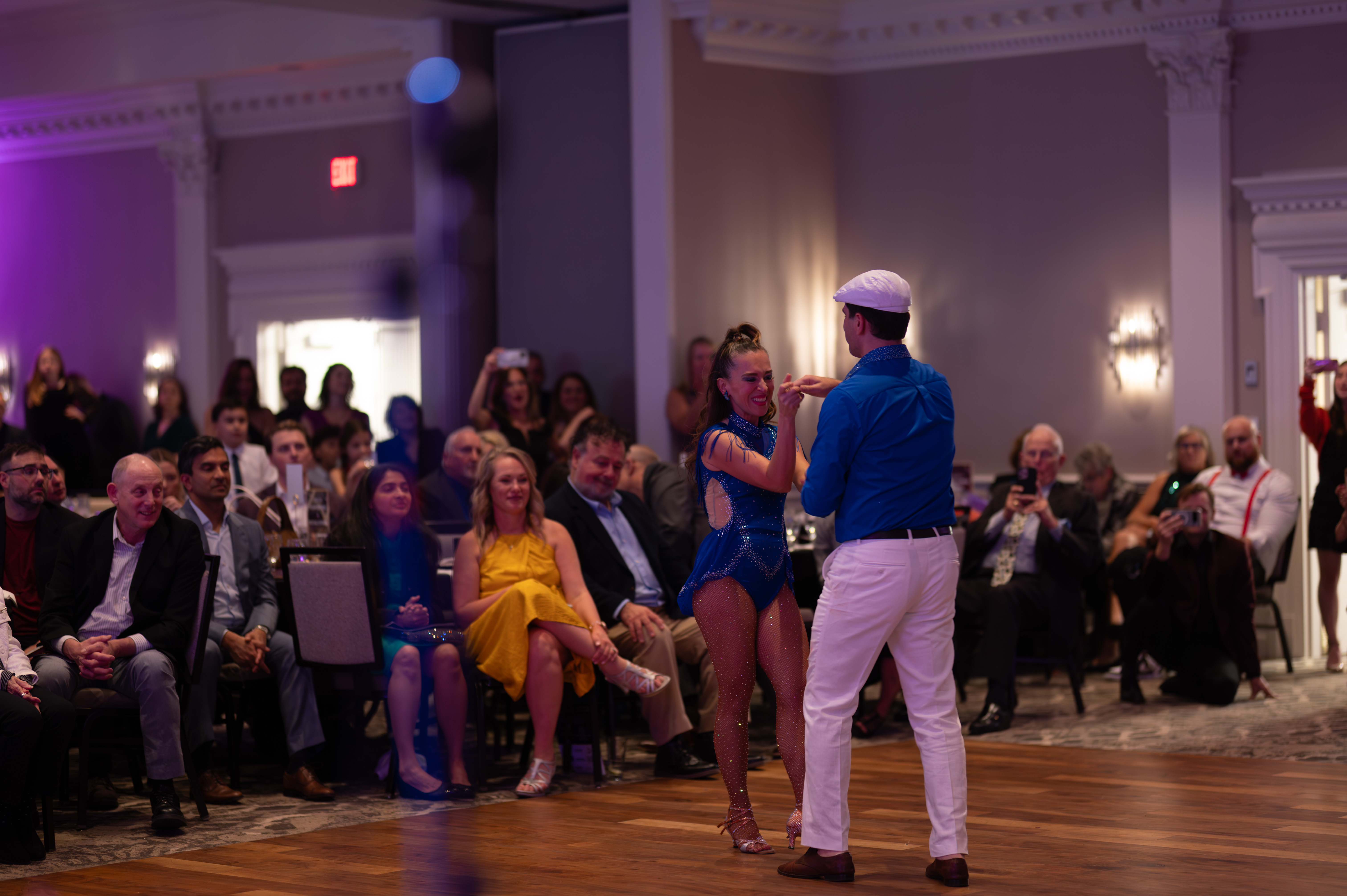 Dance partners performing at charity gala