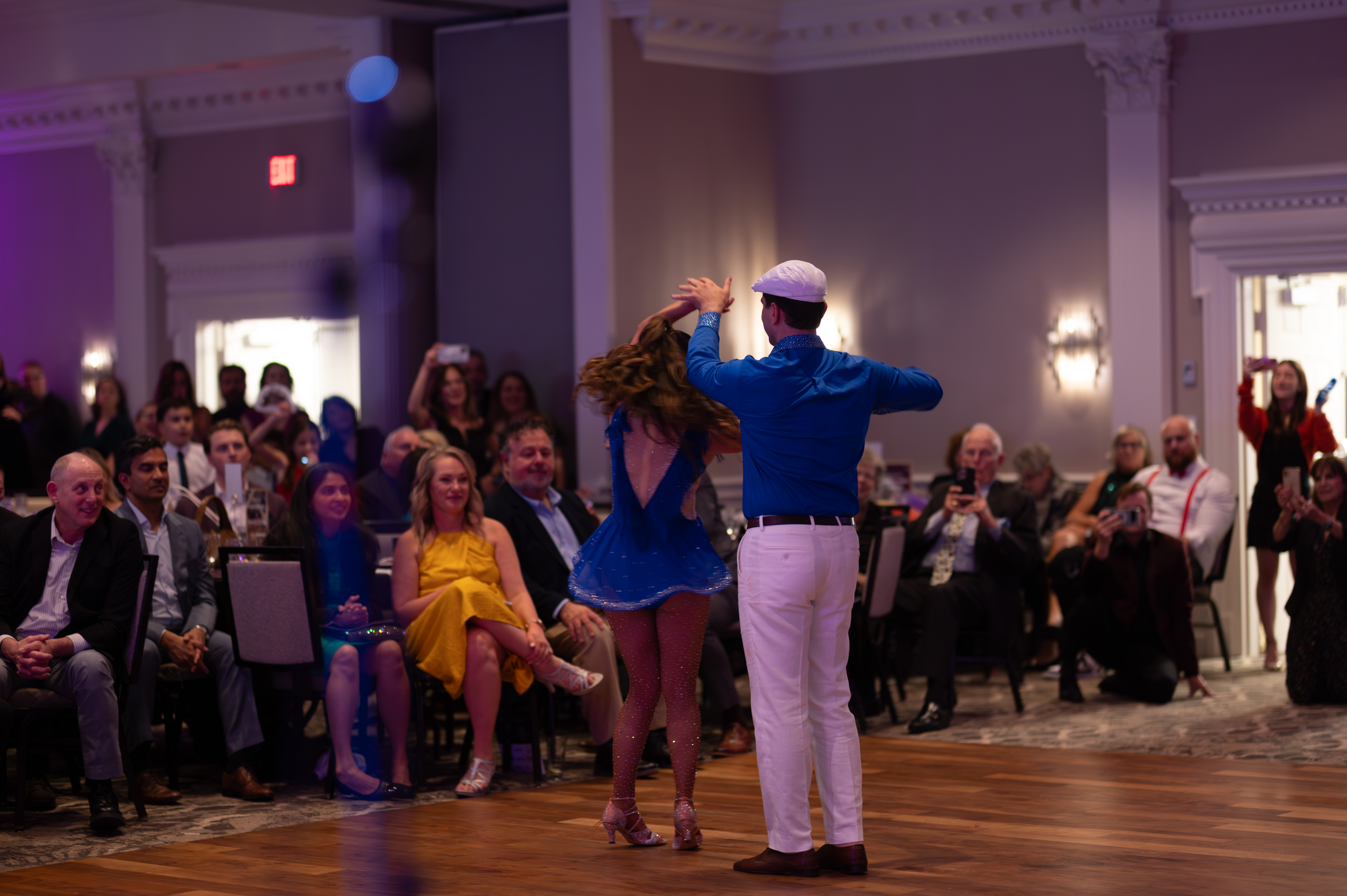 Dancers twirling at gala event