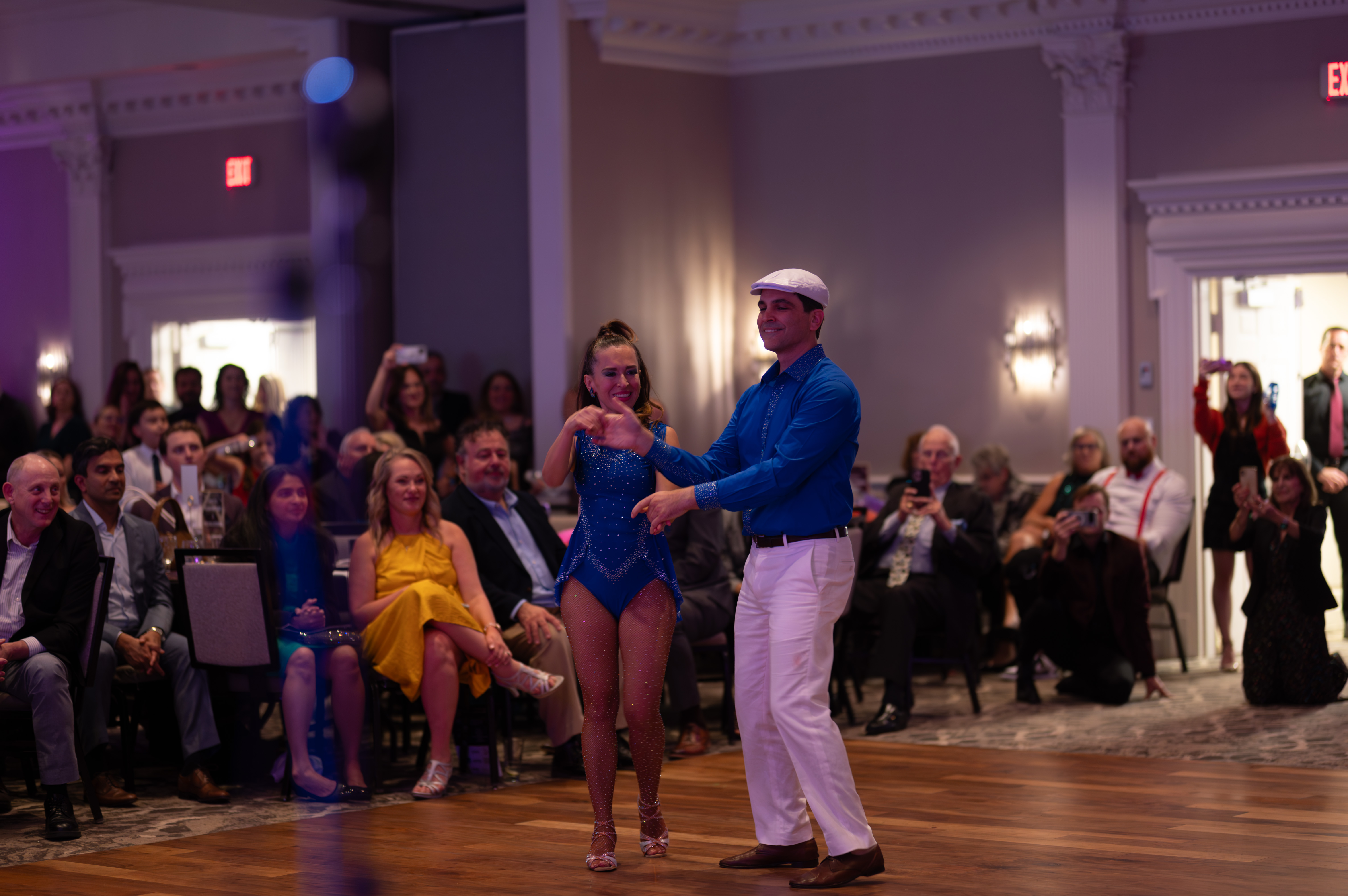 Dance partners holding hands