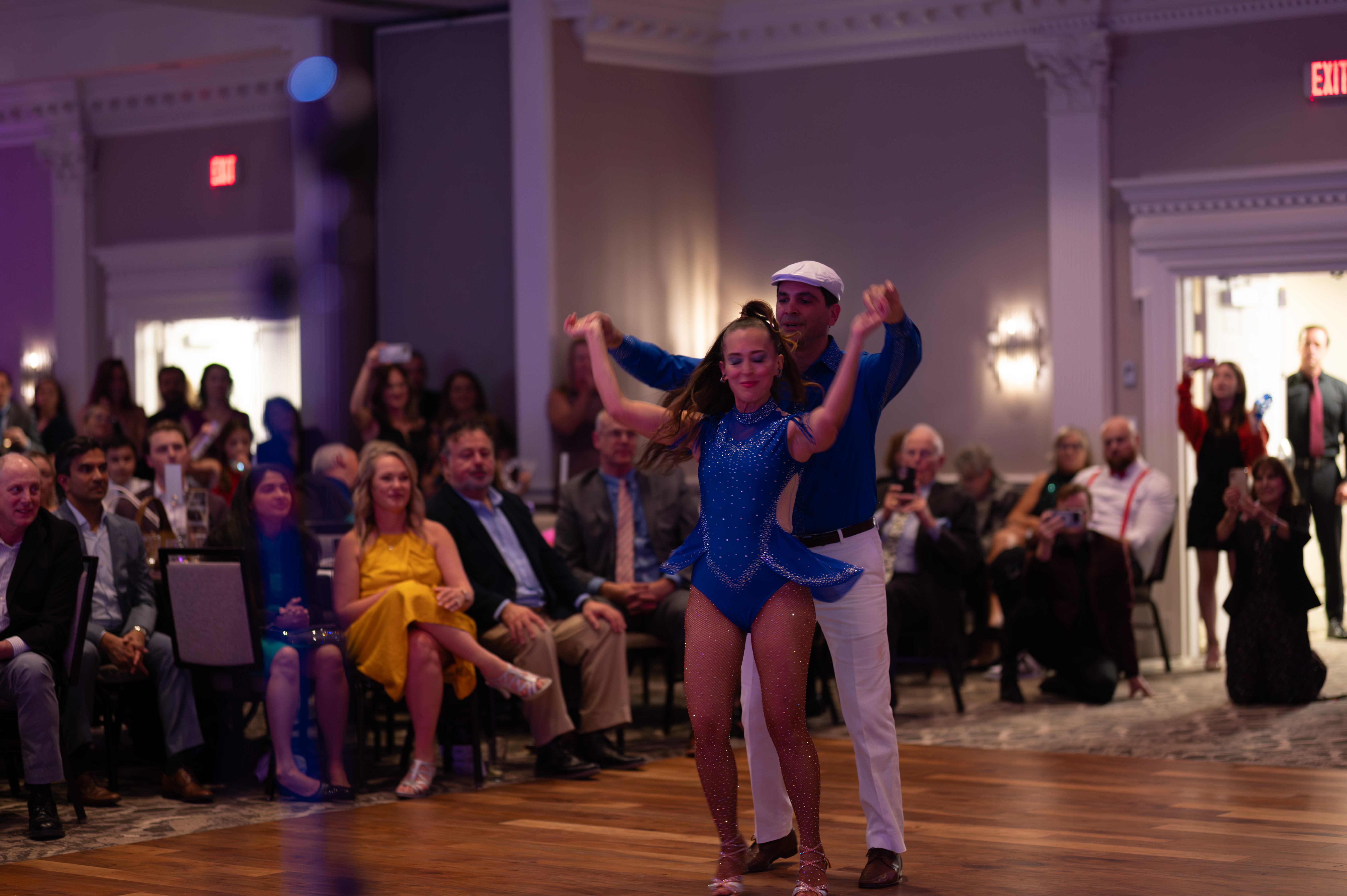 Dancers with arms raised
