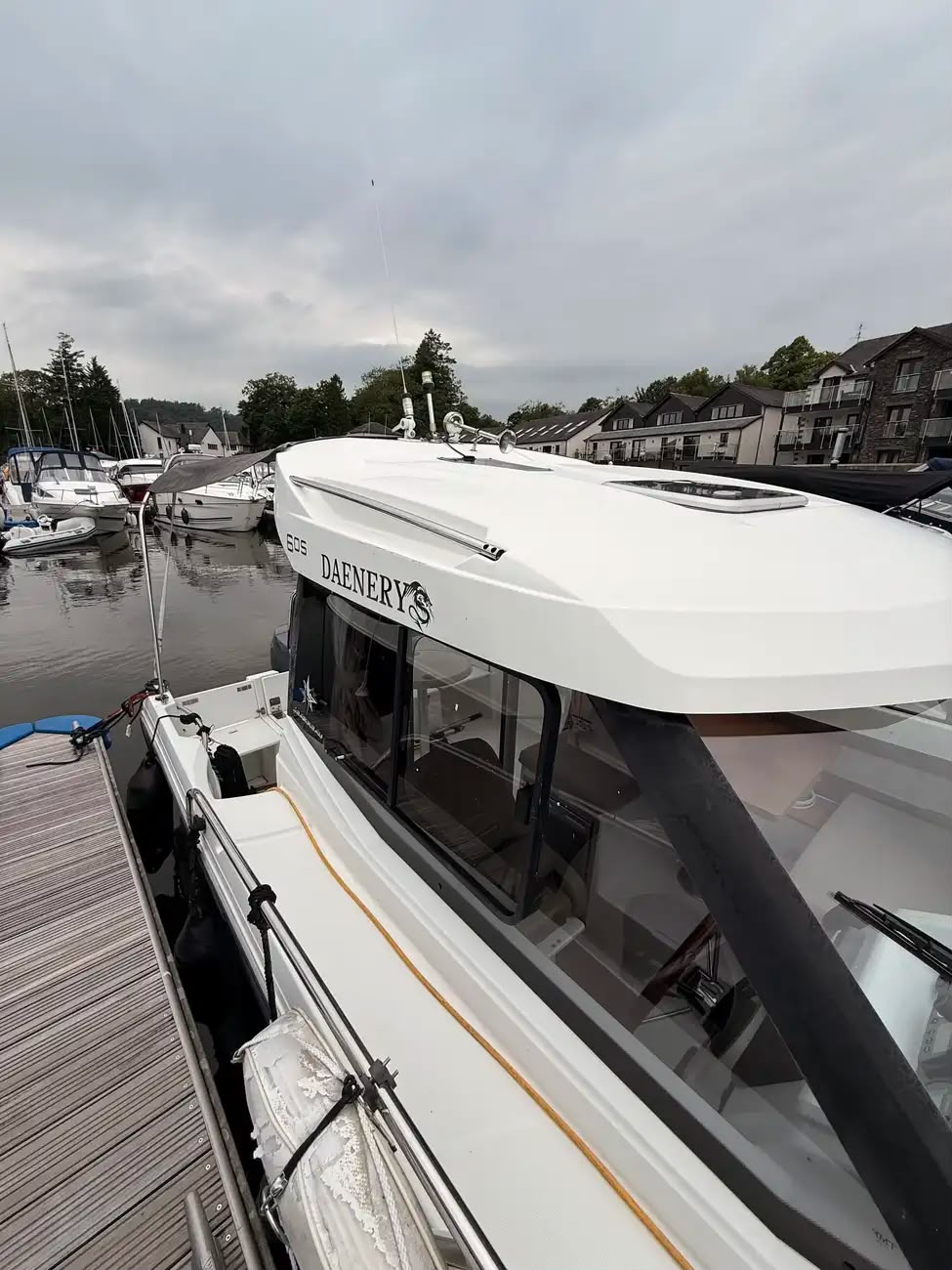 Elevated view of the coachroof with the boat name, horn and antenna